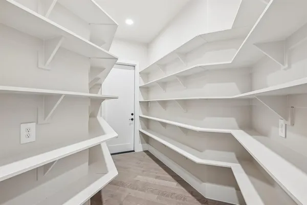 a view of an empty walk in closet