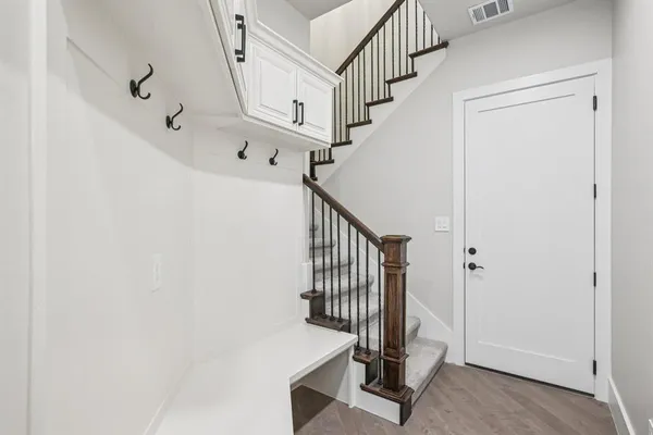 a view of entryway with a front door