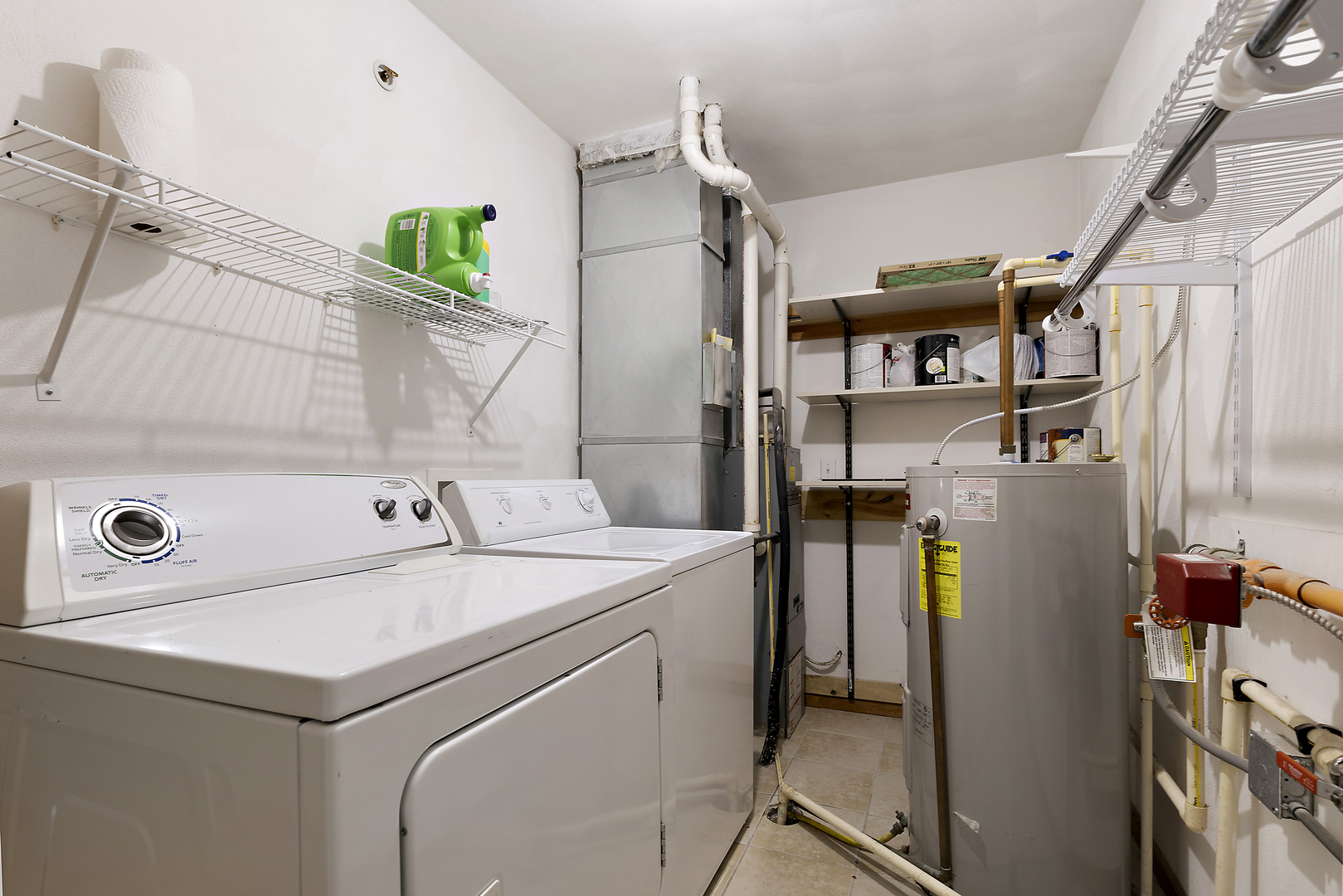 10050 Skipperling Road, Unit 1 Roscoe, IL 61073 - Photo 14 of 15 a utility room with dryer and washer
