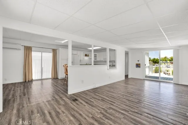 a bathroom with a shower sink and mirror