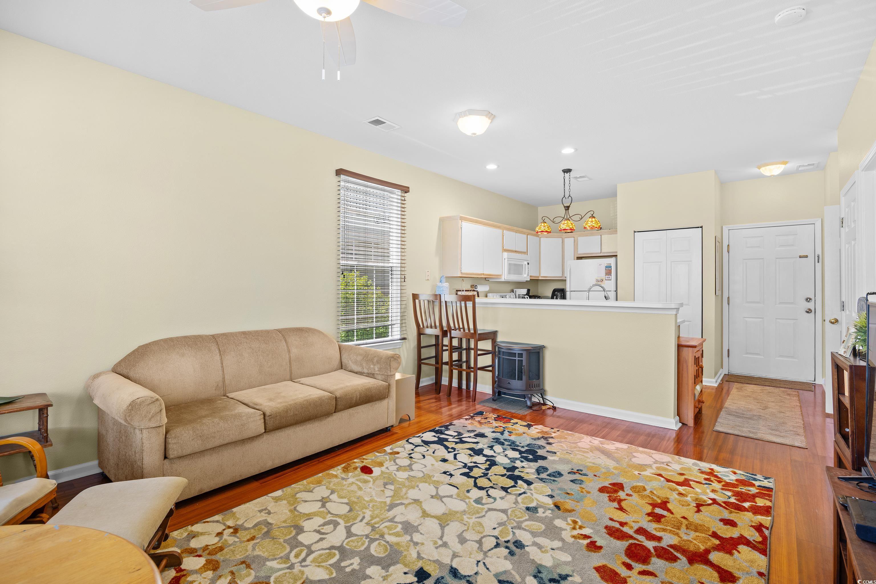 1298 River Oaks Drive, Unit 5J Myrtle Beach, SC 29579 - Photo 14 of 33 Living room featuring light wood-style floors, ceiling fan, and recessed lighting