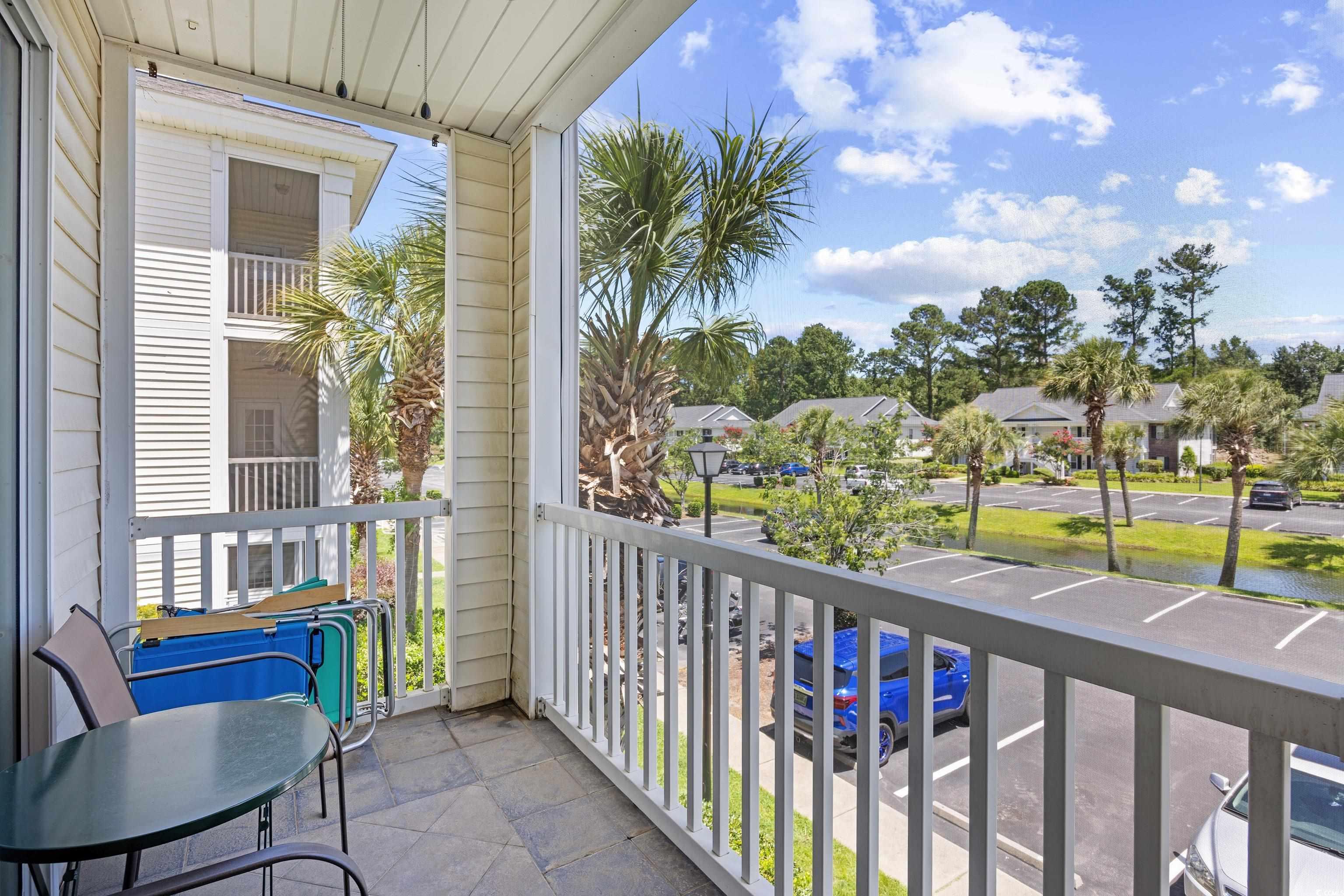 1298 River Oaks Drive, Unit 5J Myrtle Beach, SC 29579 - Photo 25 of 33 Balcony featuring a residential view