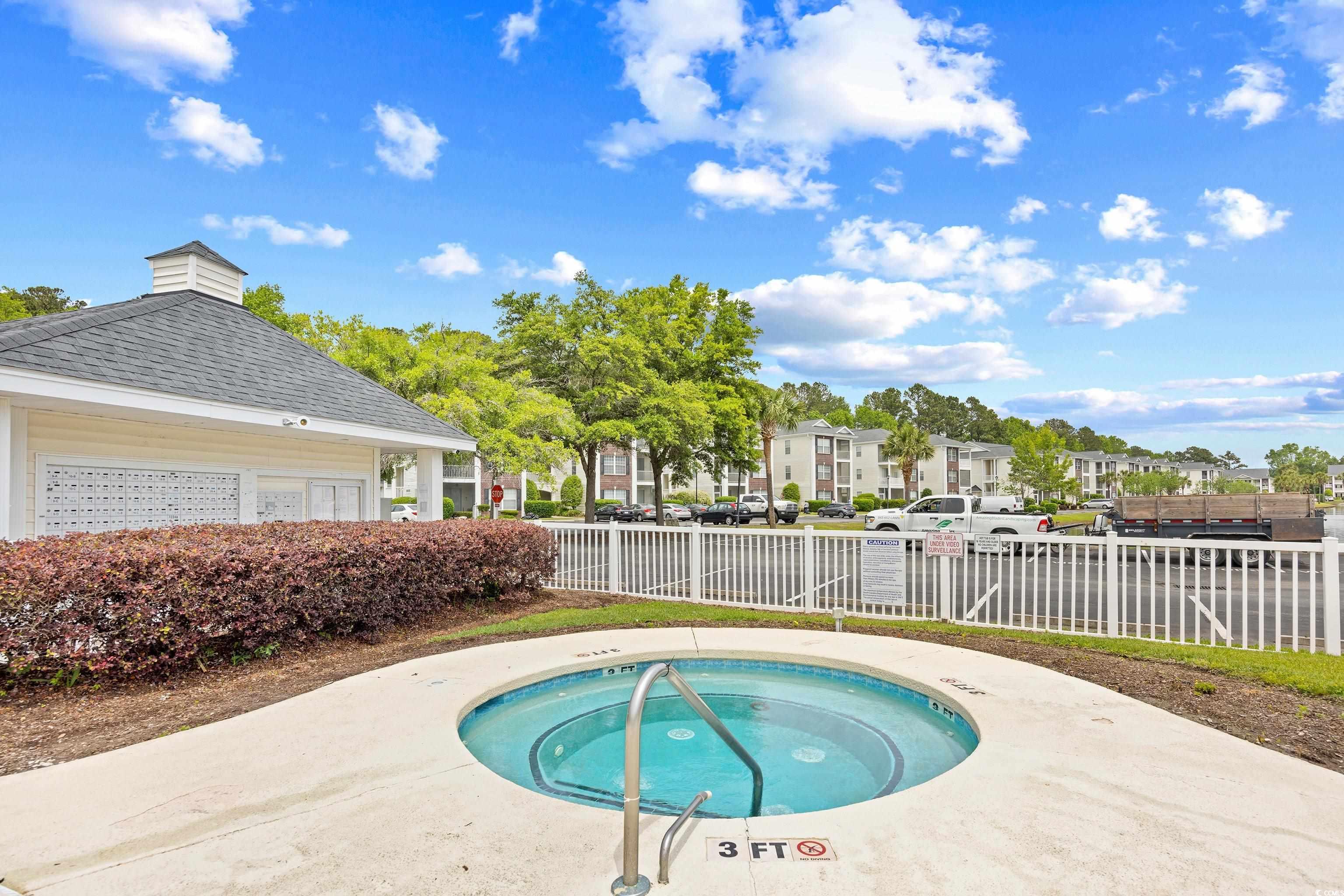 1298 River Oaks Drive, Unit 5J Myrtle Beach, SC 29579 - Photo 30 of 33 Water view with nearby suburban area