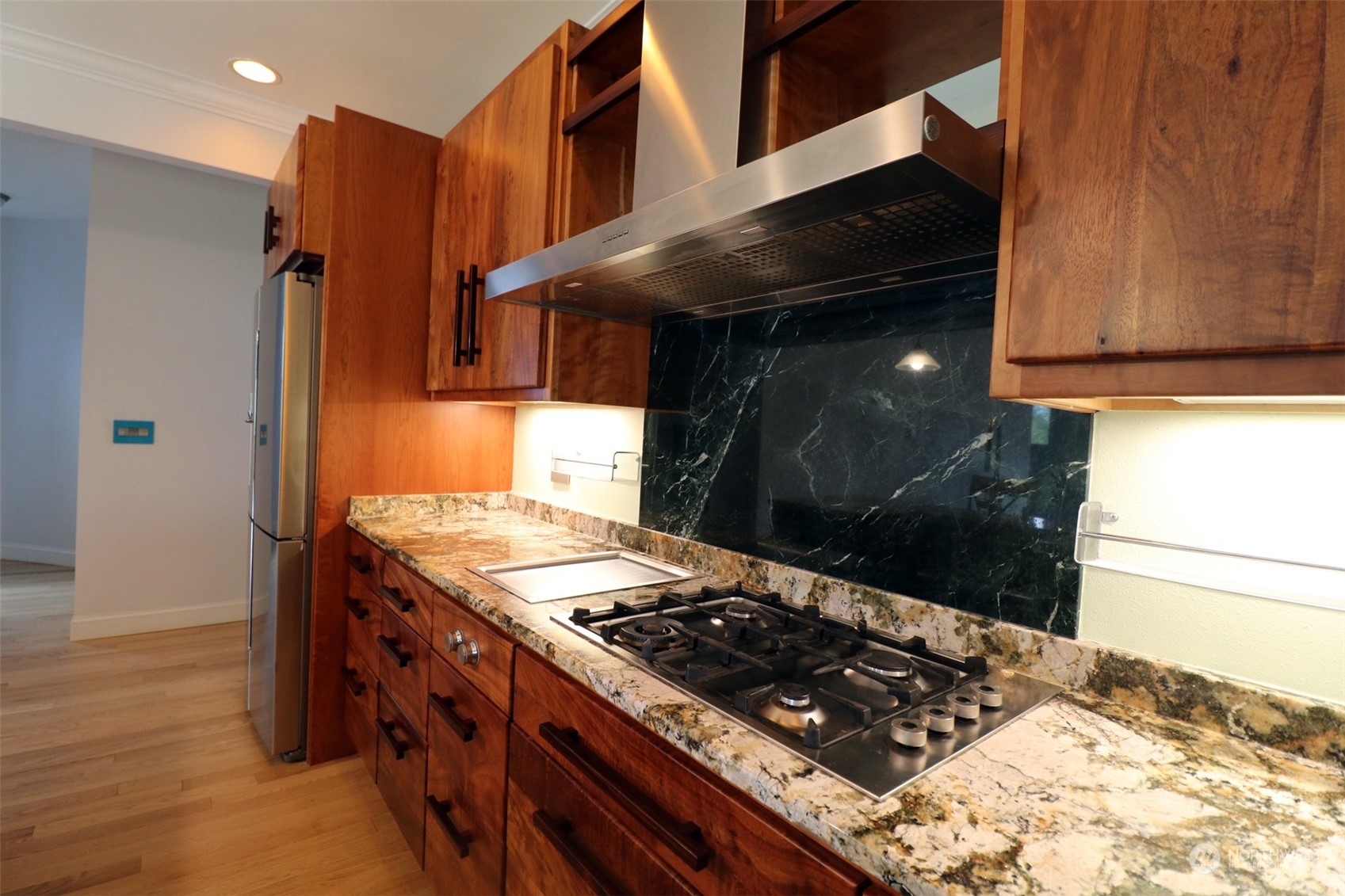 1908 4th Street Bremerton, WA 98337 - Photo 14 of 34 a kitchen with wooden cabinets and a stove top oven