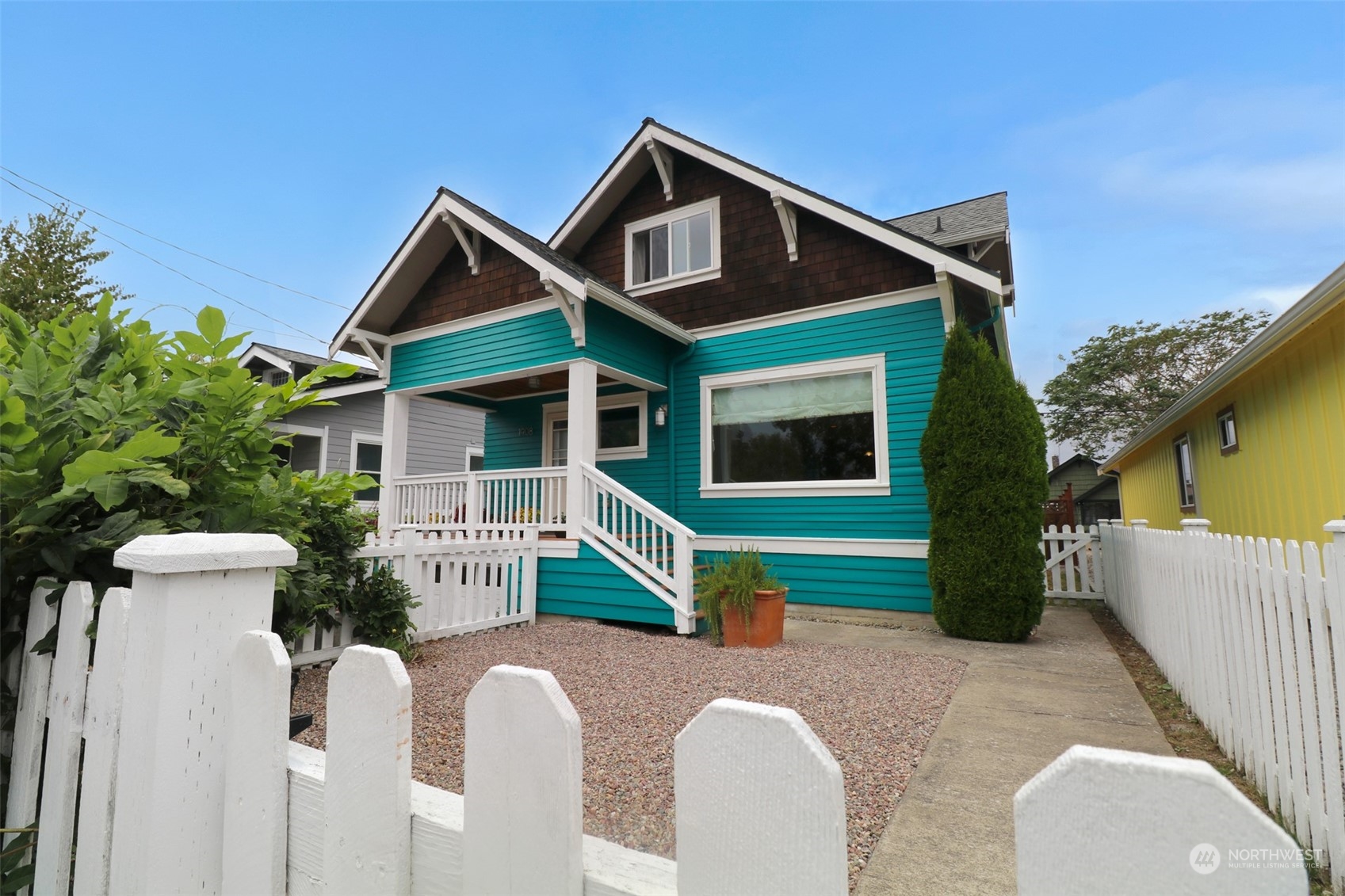 1908 4th Street Bremerton, WA 98337 - Photo 2 of 34 a front view of a house with a yard