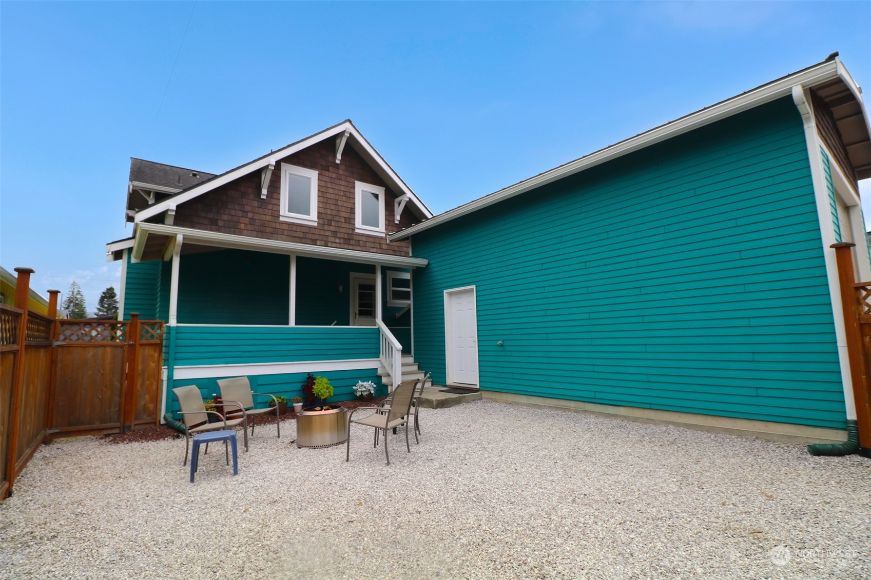 1908 4th Street Bremerton, WA 98337 - Photo 26 of 34 a view of backyard with a table and chairs