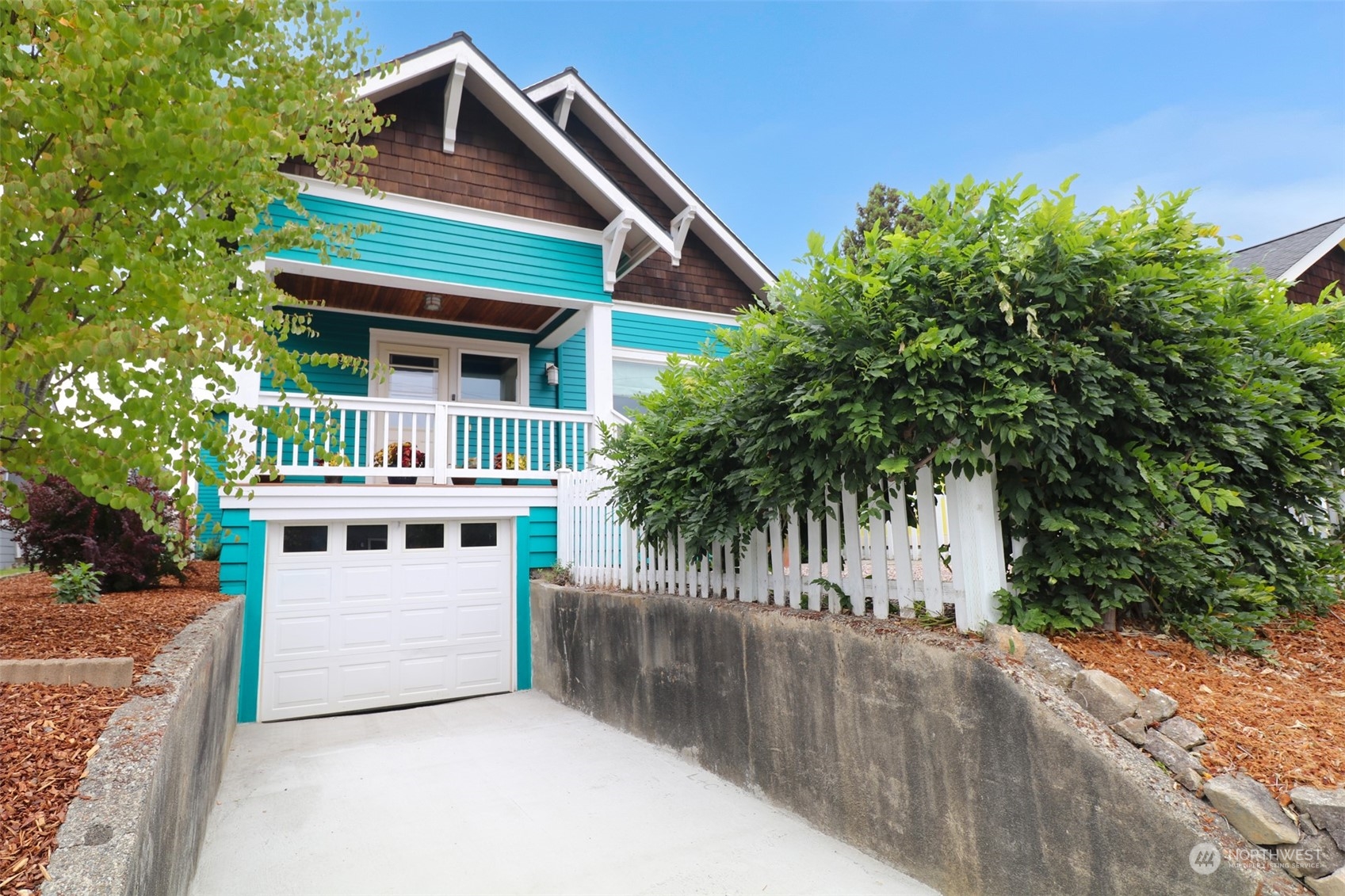 1908 4th Street Bremerton, WA 98337 - Photo 30 of 34 a front view of a house with a garden