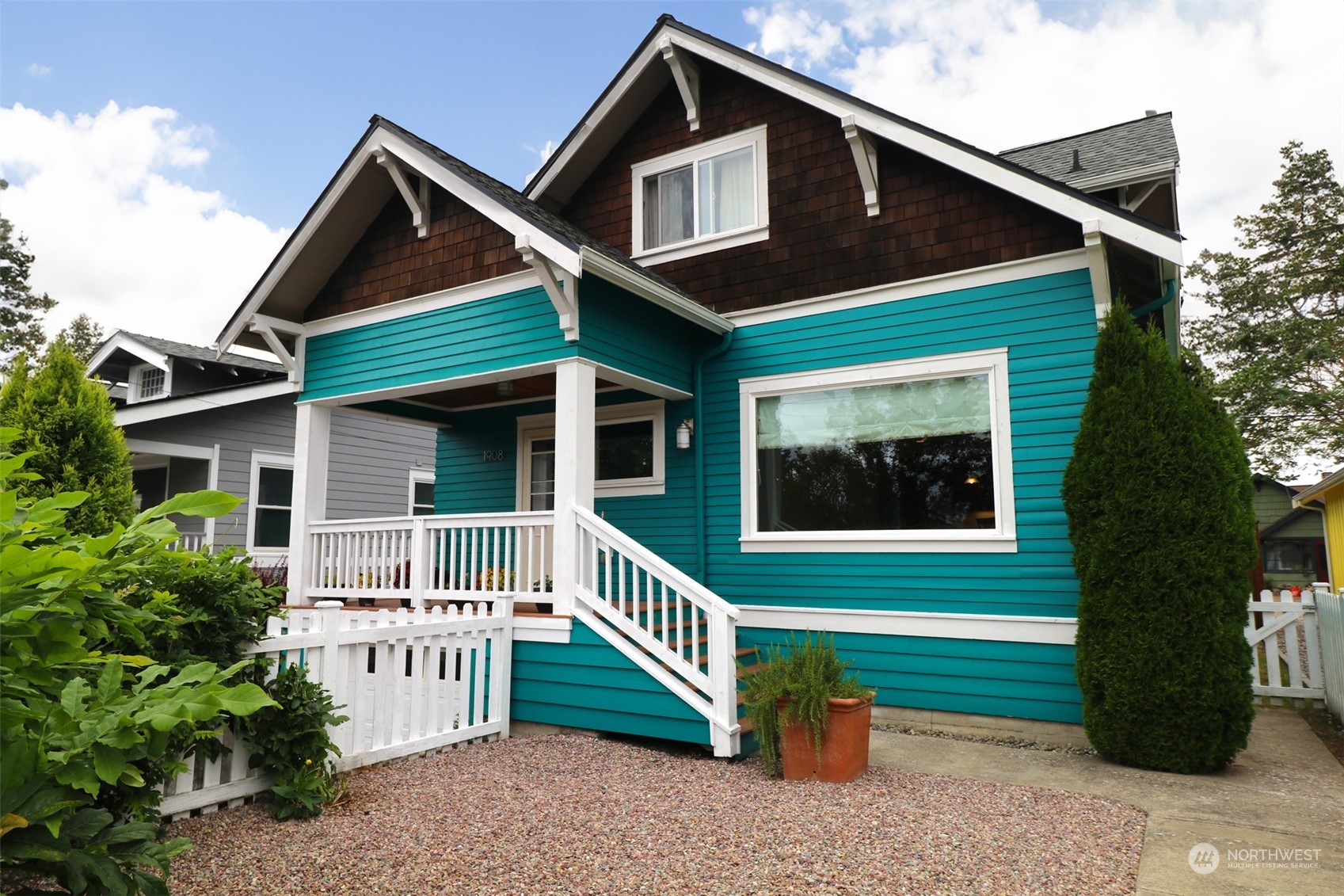 1908 4th Street Bremerton, WA 98337 - Photo 3 of 34 a front view of a house with a garden