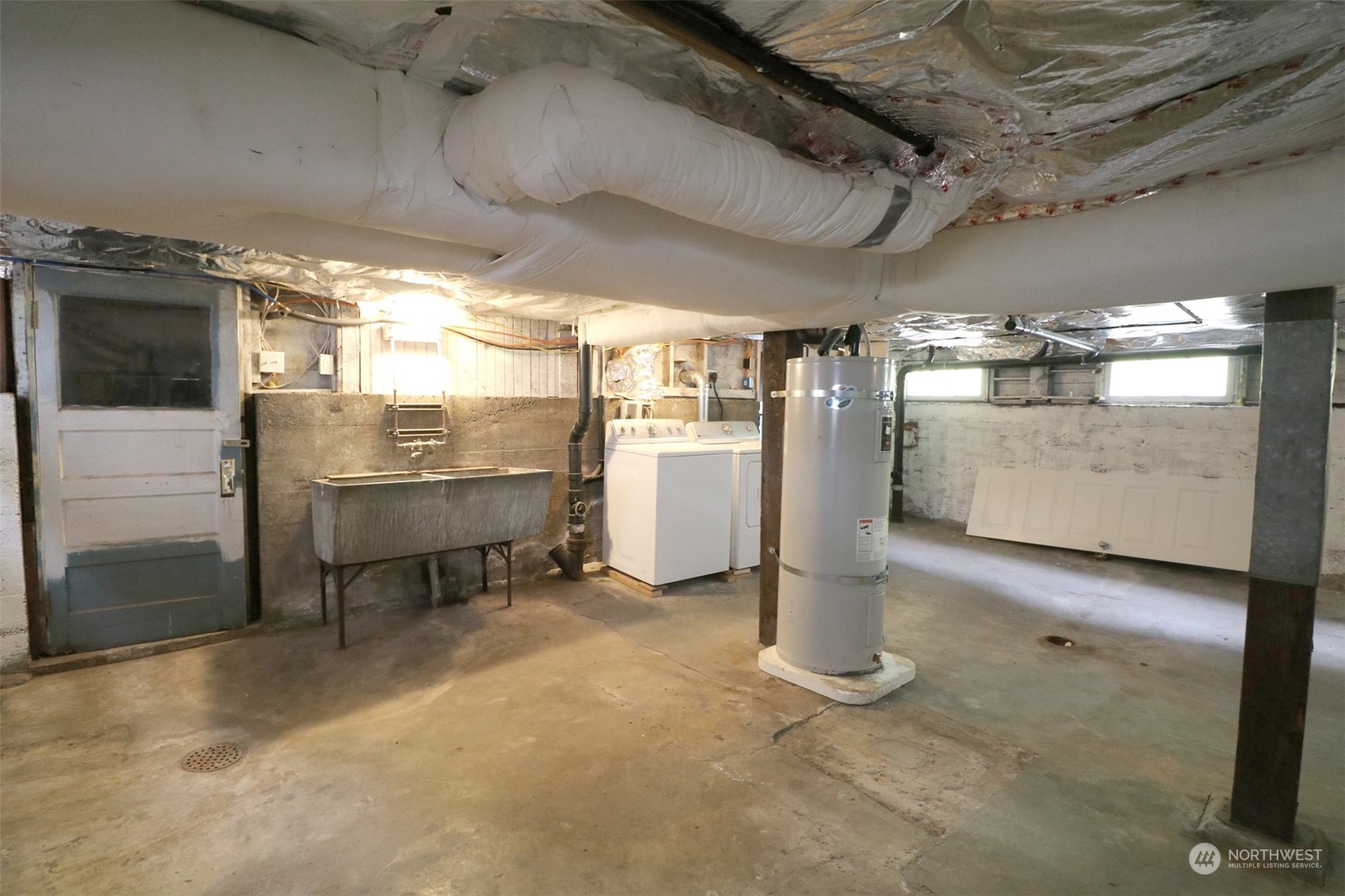 1908 4th Street Bremerton, WA 98337 - Photo 34 of 34 a room with water heater and stainless steel appliances