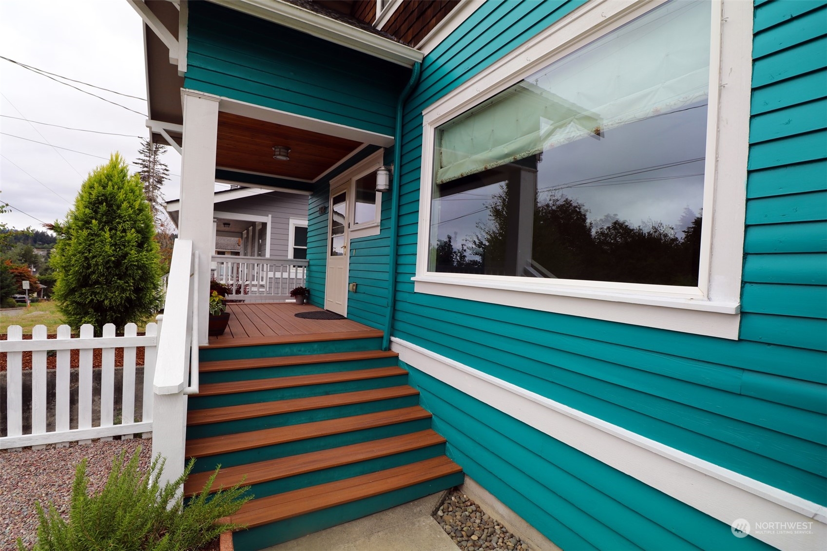 1908 4th Street Bremerton, WA 98337 - Photo 4 of 34 a front view of a house with a garden