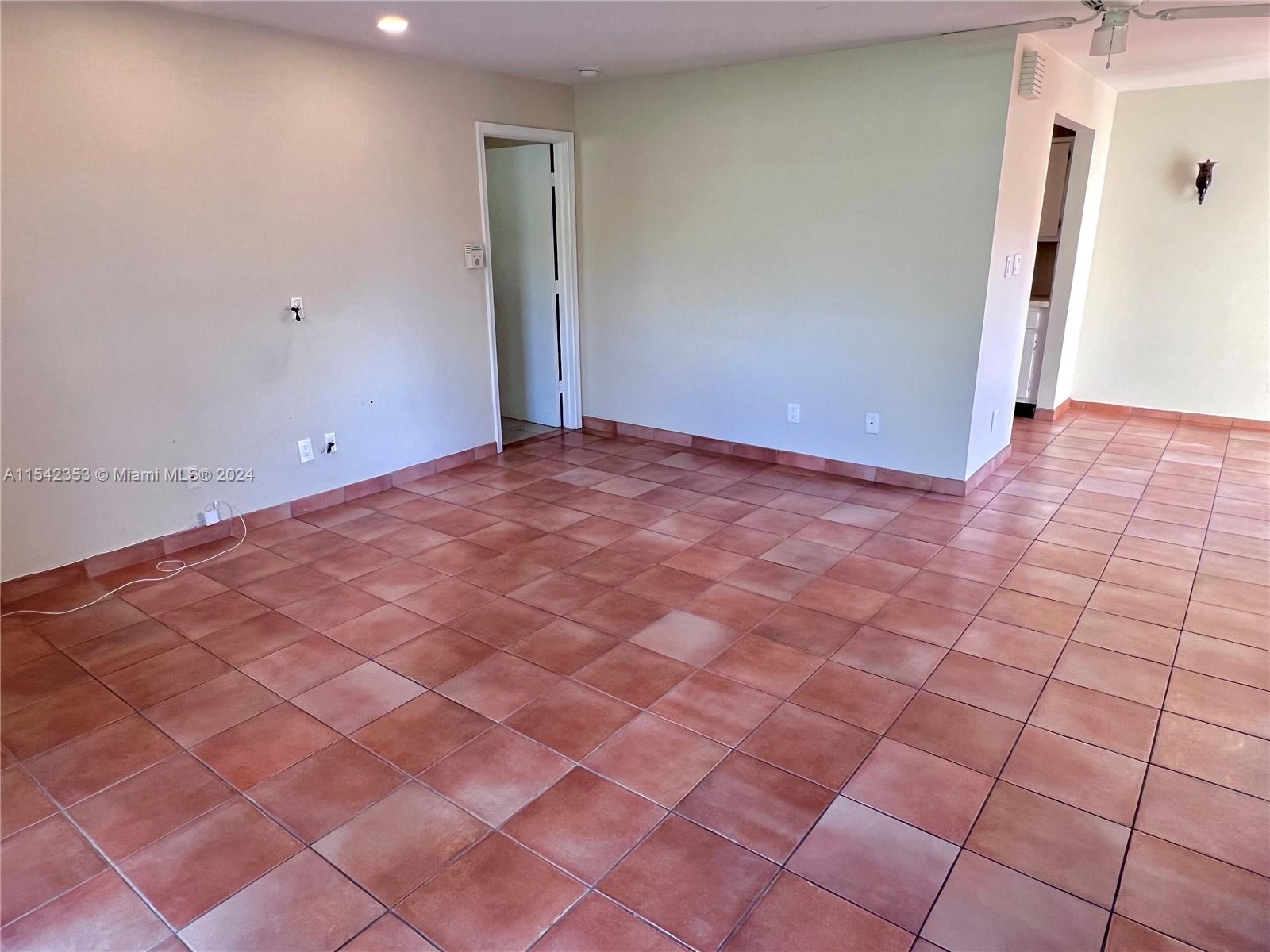 11353 Southwest 109th Road, Unit 55Z Miami, FL 33176 - Photo 13 of 82 a view of an empty room