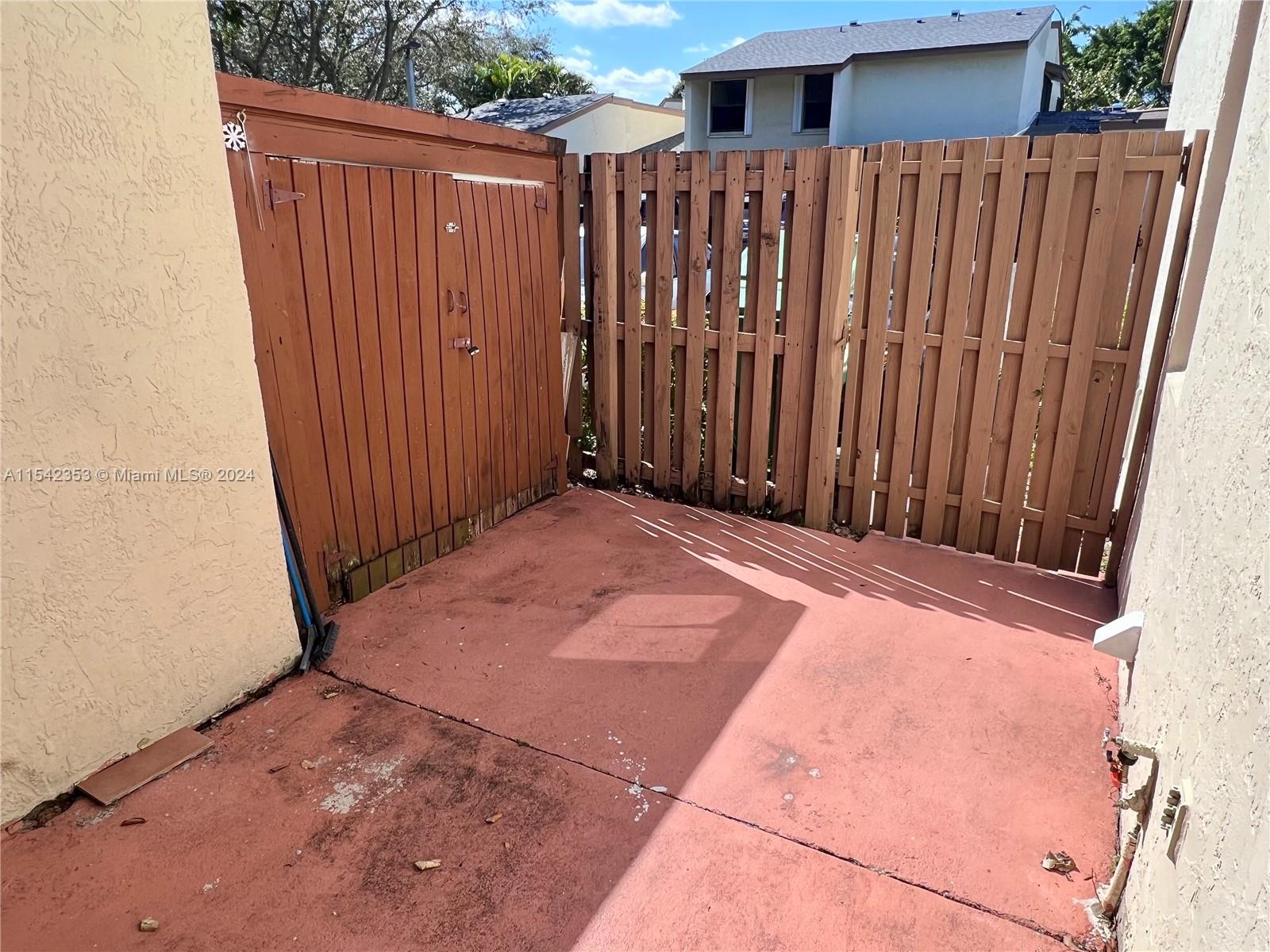 11353 Southwest 109th Road, Unit 55Z Miami, FL 33176 - Photo 23 of 82 a view of a backyard of the house