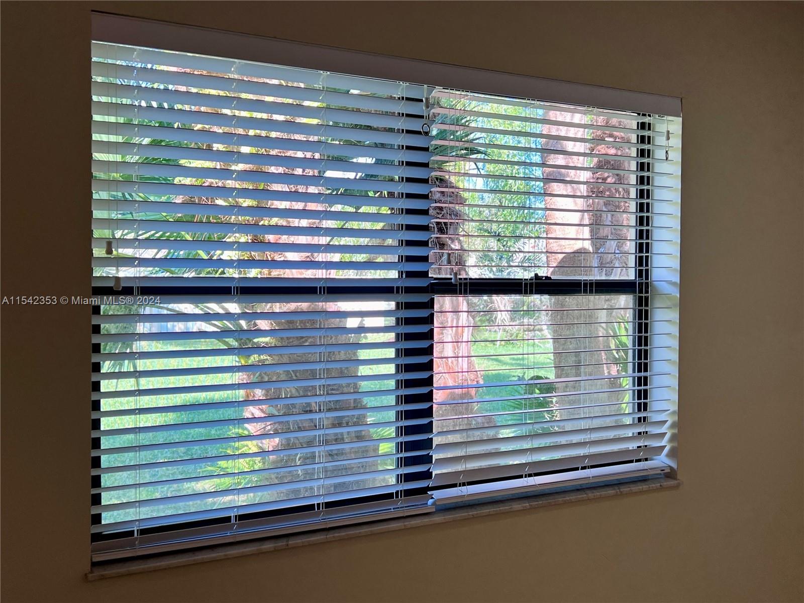 11353 Southwest 109th Road, Unit 55Z Miami, FL 33176 - Photo 41 of 82 a view of a window and kitchen