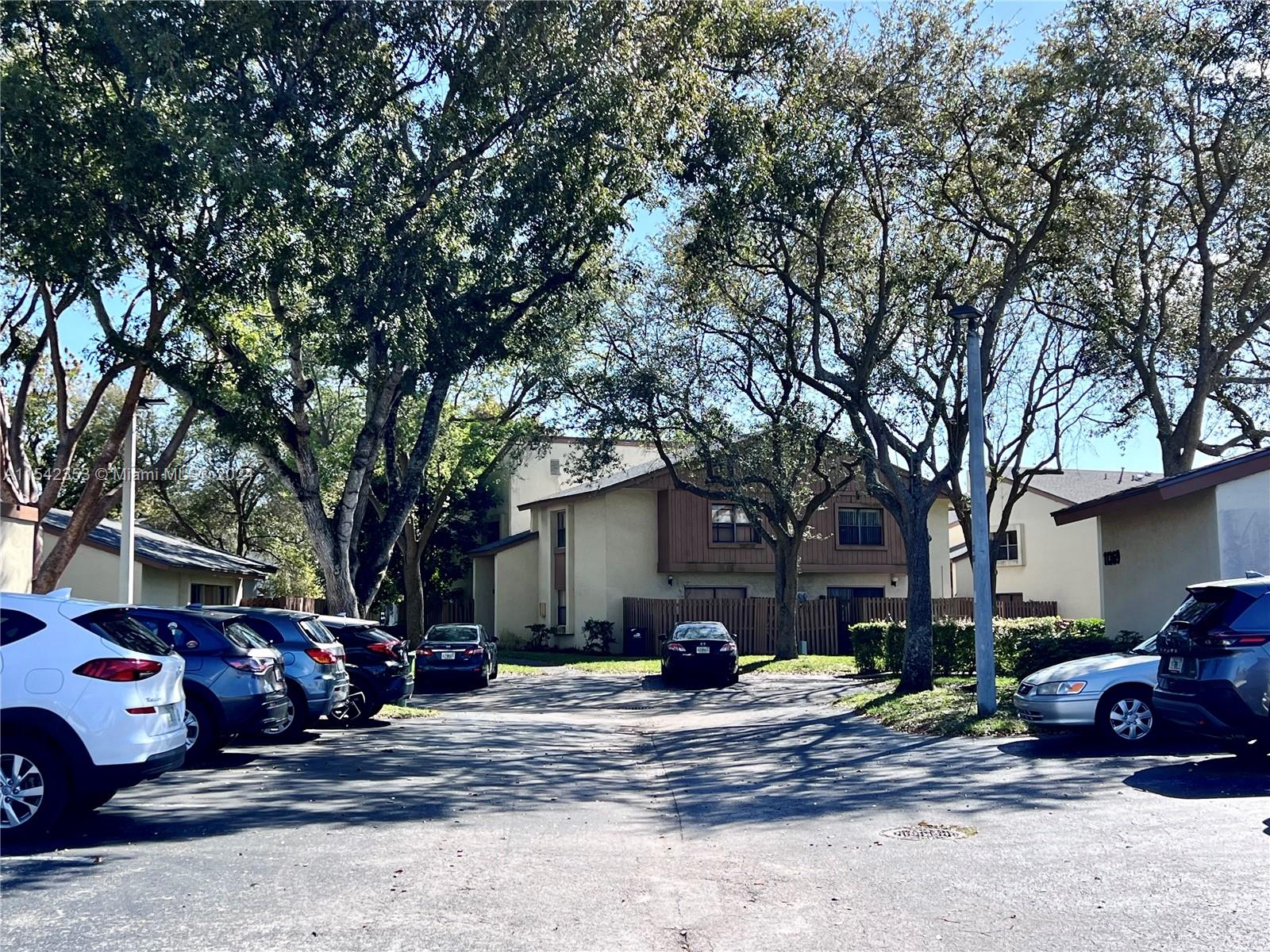 11353 Southwest 109th Road, Unit 55Z Miami, FL 33176 - Photo 57 of 82 a view of a house with a patio