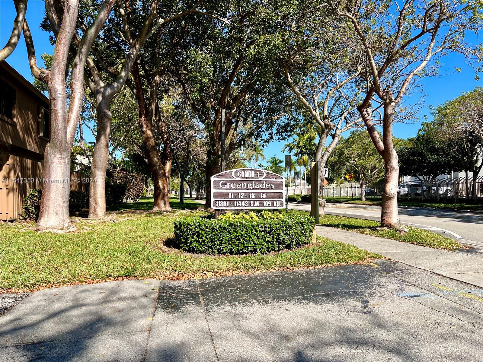 11353 Southwest 109th Road, Unit 55Z Miami, FL 33176 - Photo 58 of 82 a view of a park that has a tree on the side of it