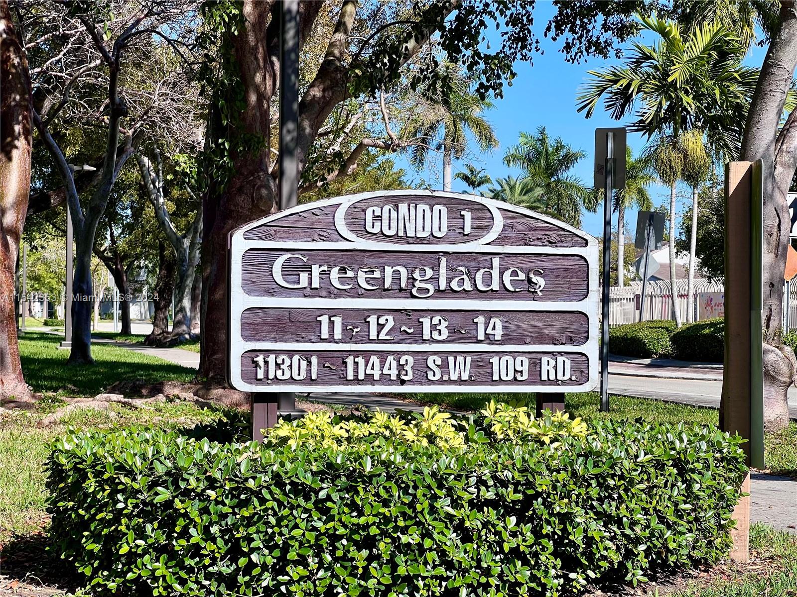 11353 Southwest 109th Road, Unit 55Z Miami, FL 33176 - Photo 59 of 82 a sign on the side of the building