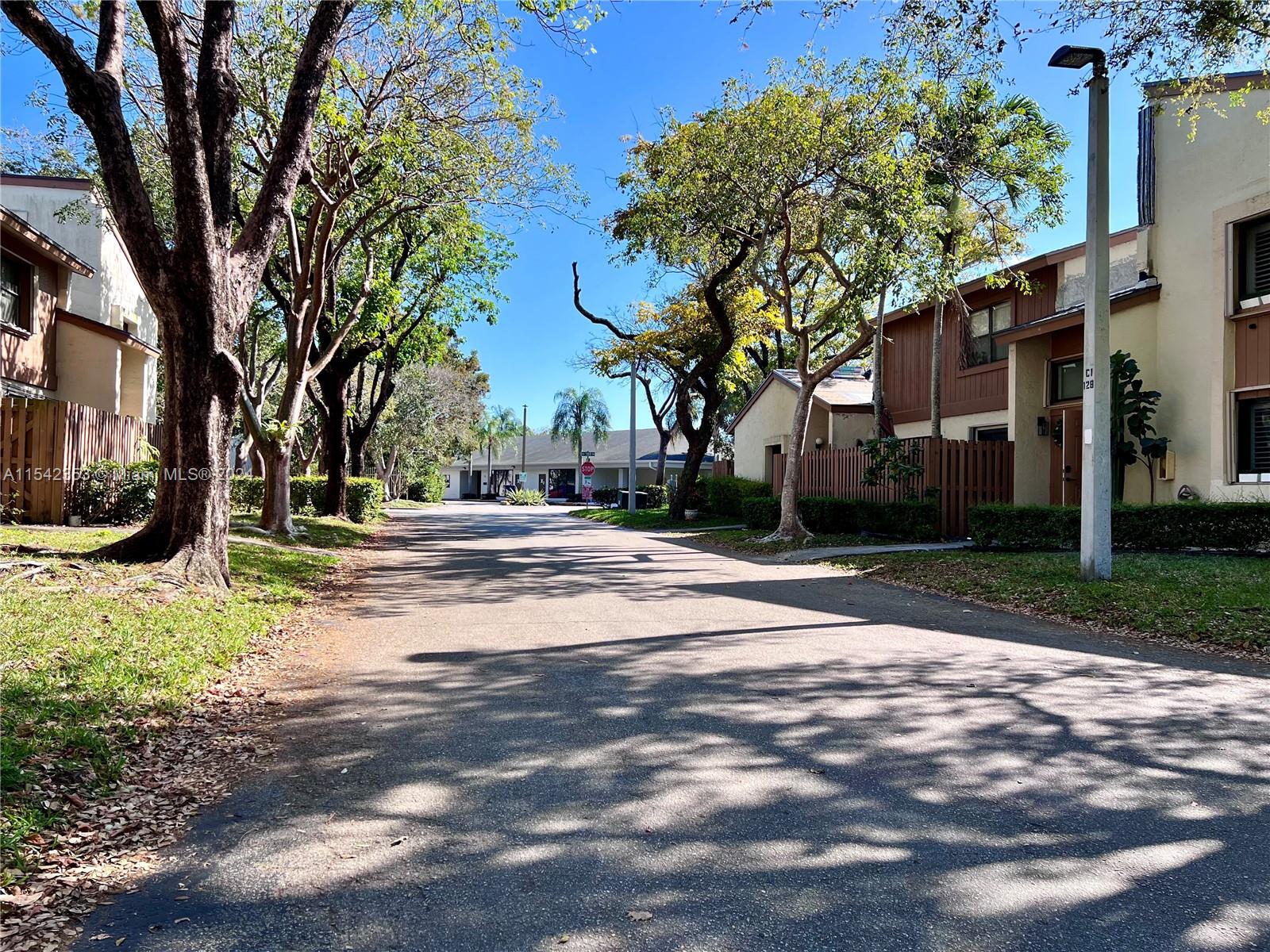11353 Southwest 109th Road, Unit 55Z Miami, FL 33176 - Photo 60 of 82 a view of road with trees