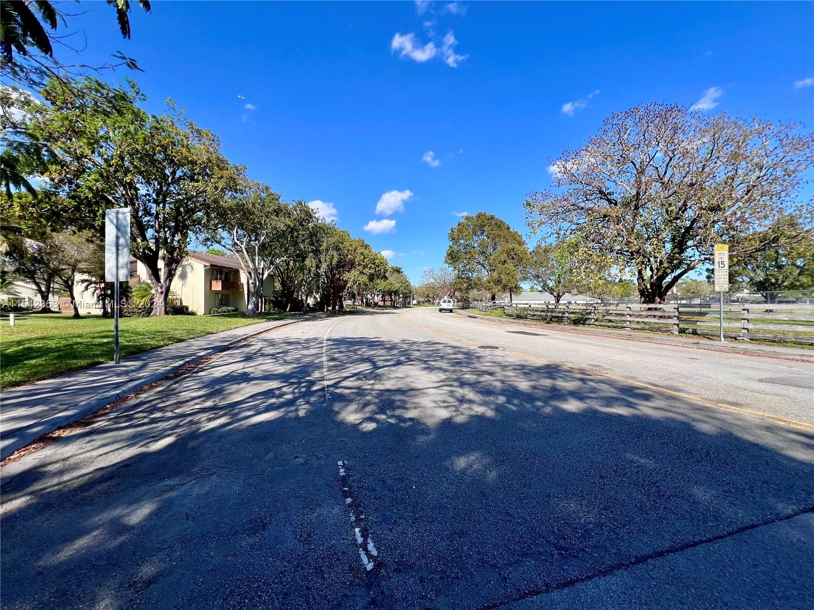 11353 Southwest 109th Road, Unit 55Z Miami, FL 33176 - Photo 62 of 82 a view of road with trees