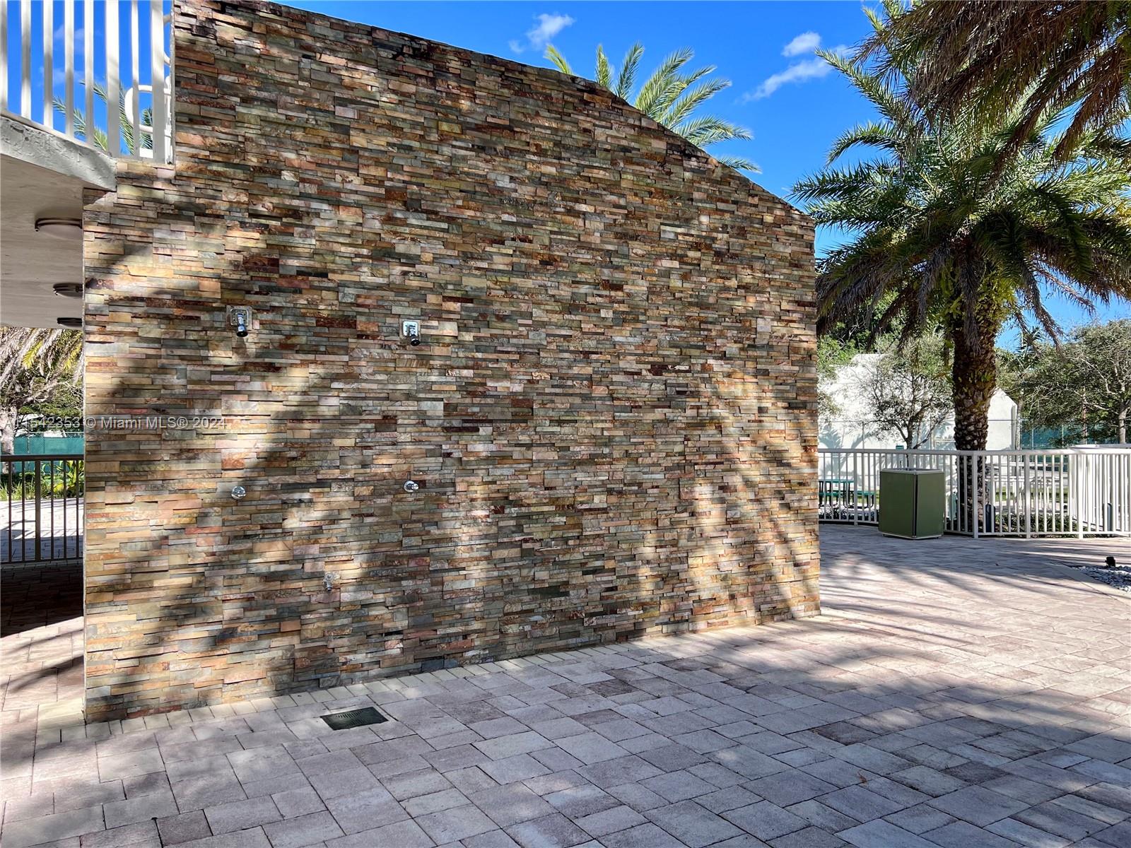 11353 Southwest 109th Road, Unit 55Z Miami, FL 33176 - Photo 68 of 82 a view of a backyard of the house