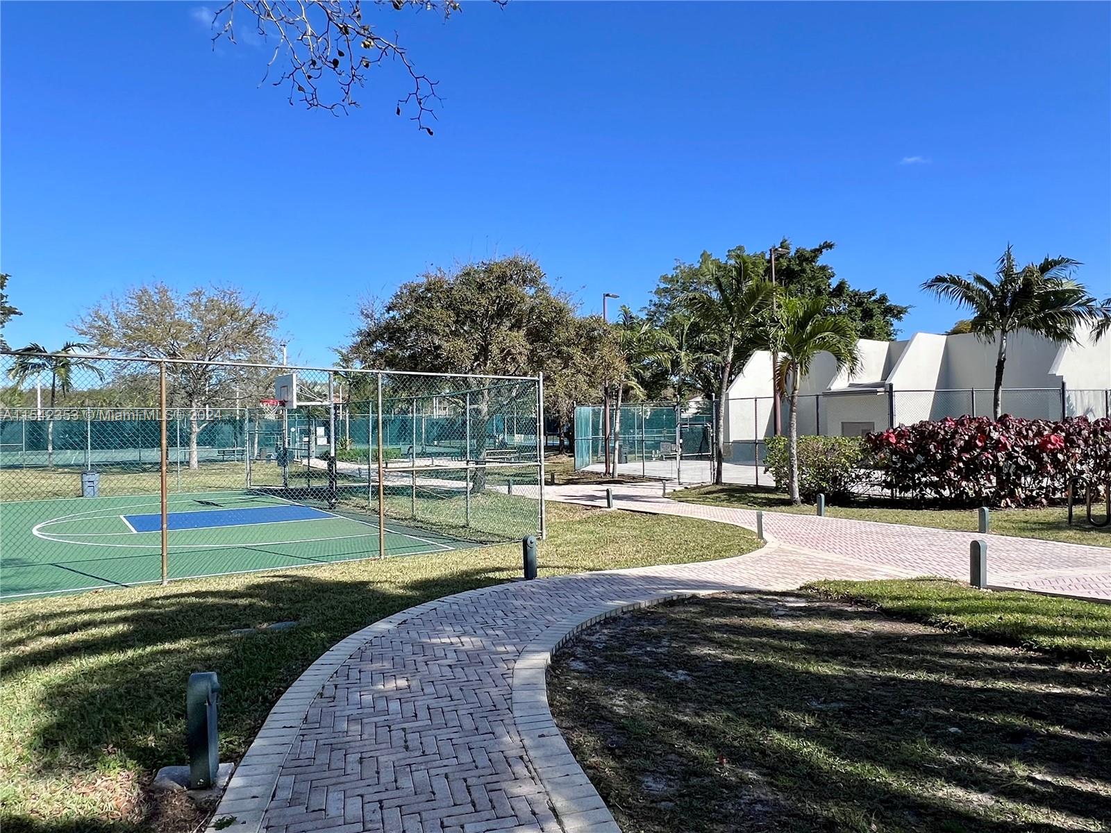 11353 Southwest 109th Road, Unit 55Z Miami, FL 33176 - Photo 72 of 82 a view of a swimming pool with a yard