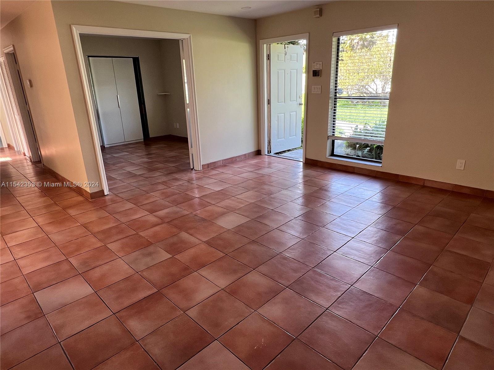 11353 Southwest 109th Road, Unit 55Z Miami, FL 33176 - Photo 8 of 82 an empty room with windows