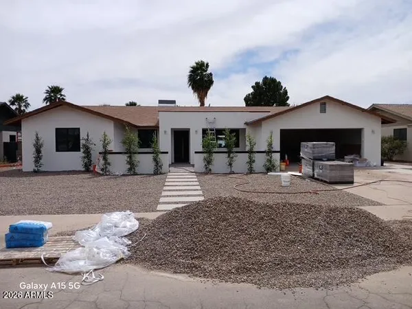 a front view of a house with patio