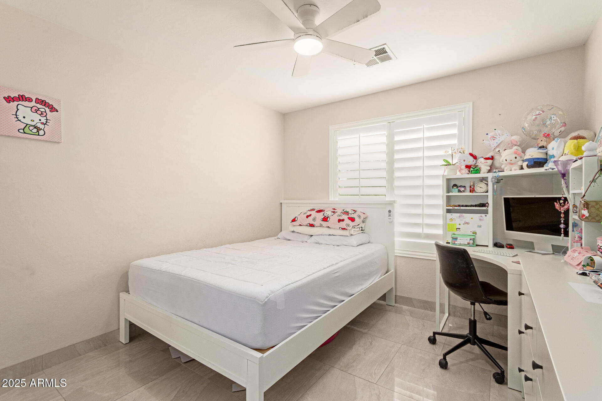 1448 North Saddle Street Gilbert, AZ 85233 - Photo 25 of 34 a bedroom with a bed and a desk