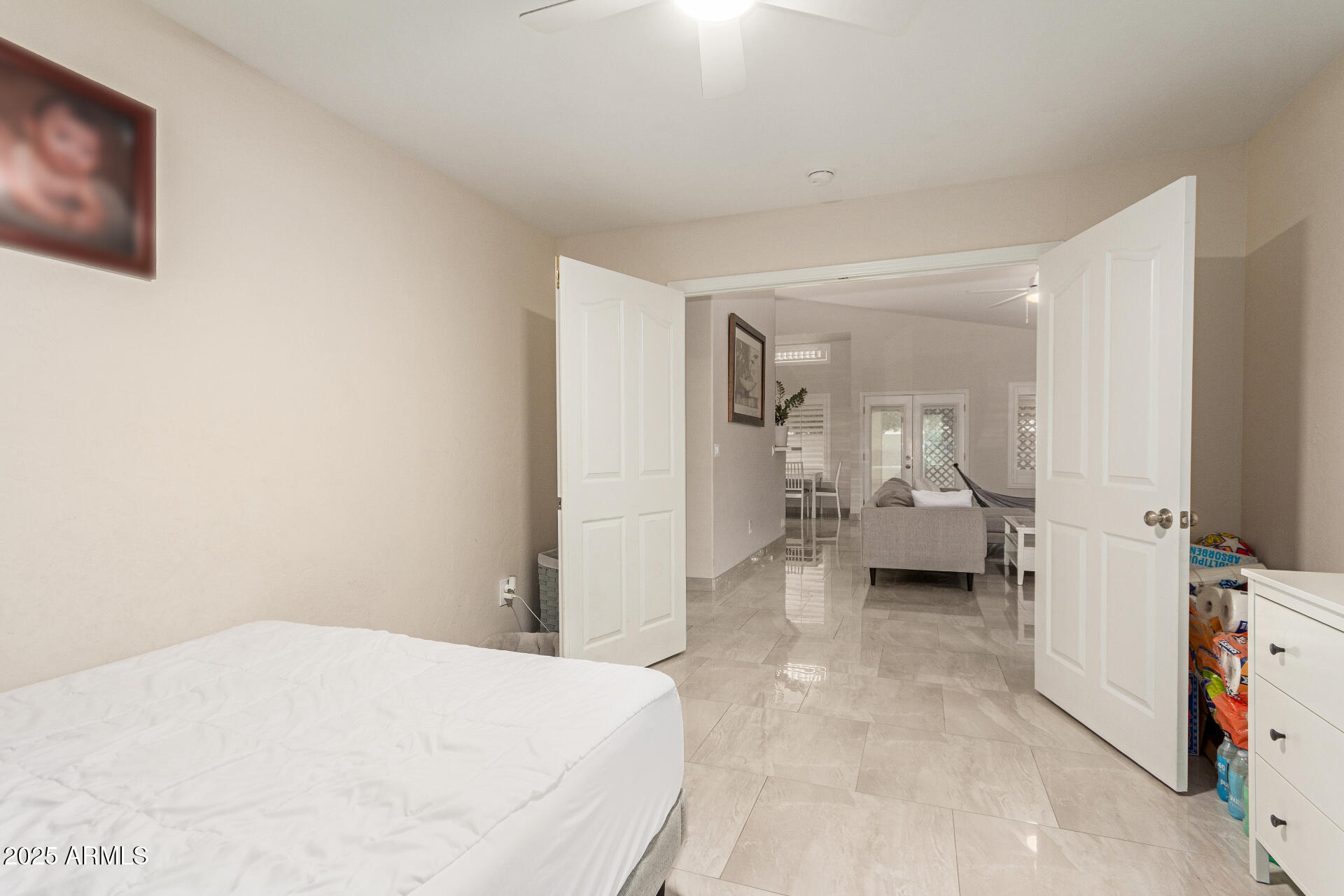 1448 North Saddle Street Gilbert, AZ 85233 - Photo 28 of 34 a spacious bedroom with a bed and a view of bathroom