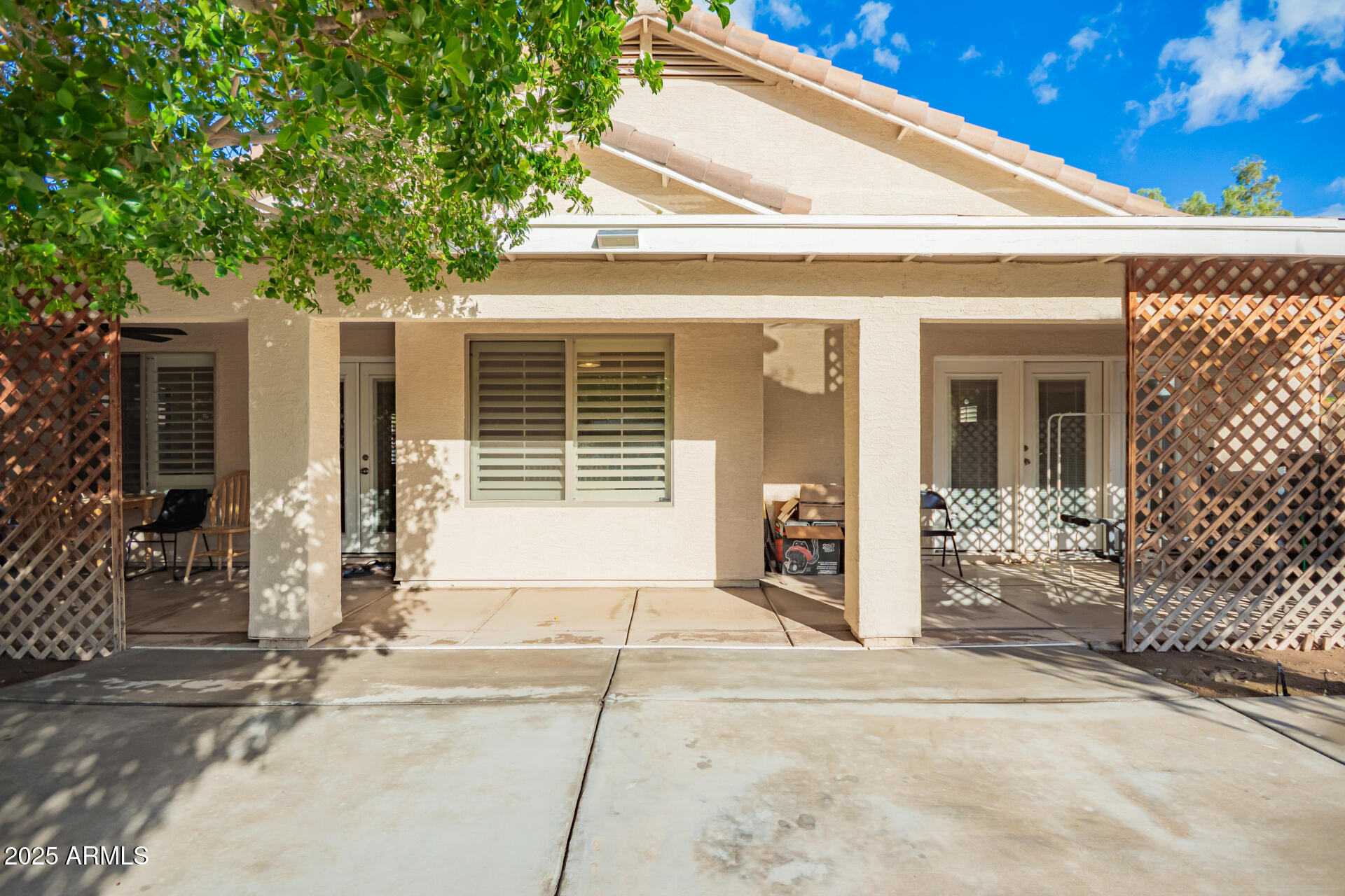 1448 North Saddle Street Gilbert, AZ 85233 - Photo 34 of 34 a front view of a house with a garage
