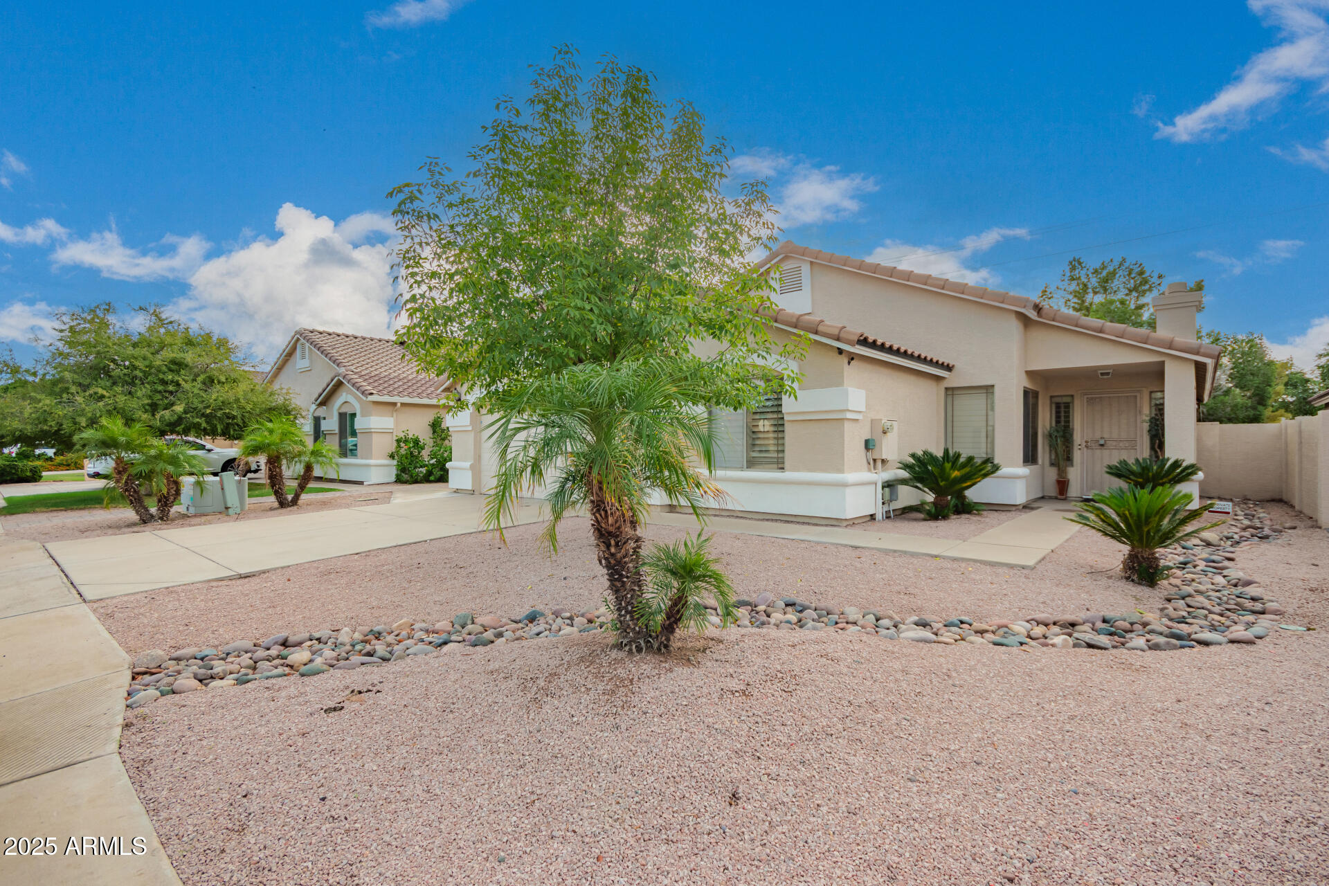 1448 North Saddle Street Gilbert, AZ 85233 - Photo 5 of 34 front view of a house with a street