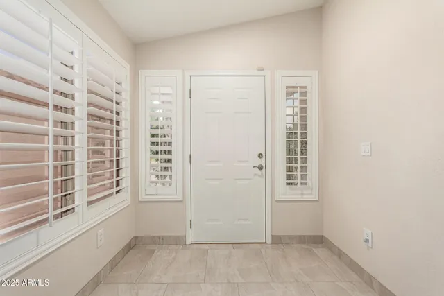 an empty room with windows