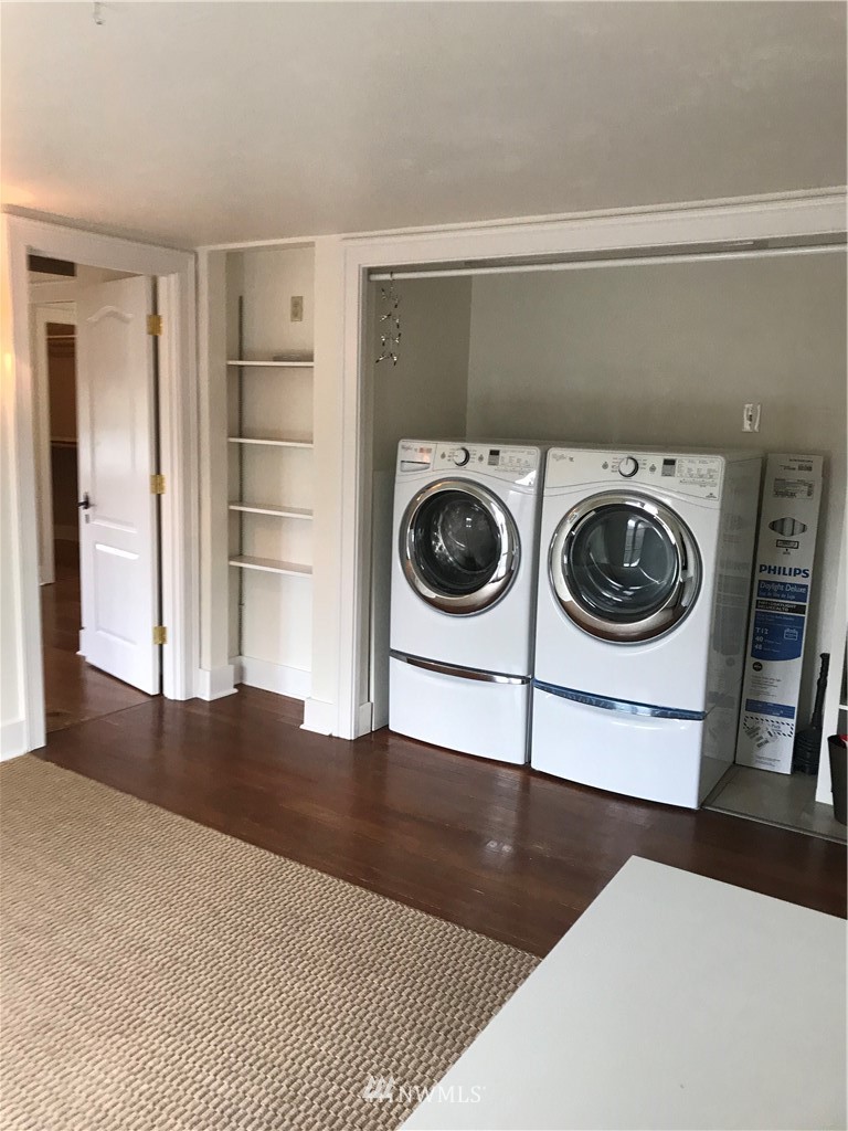 1569 North Fork Road Chehalis, WA 98532 - Photo 16 of 20 a view of a hallway with washer and dryer