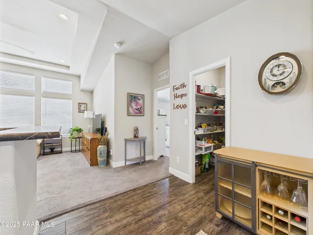 a view of living room with furniture and window