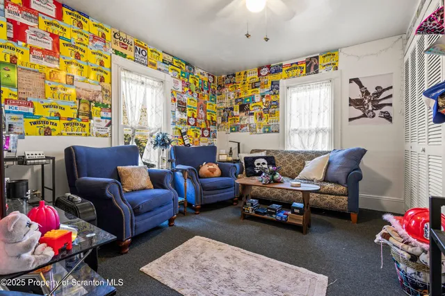 a living room with furniture and a couch