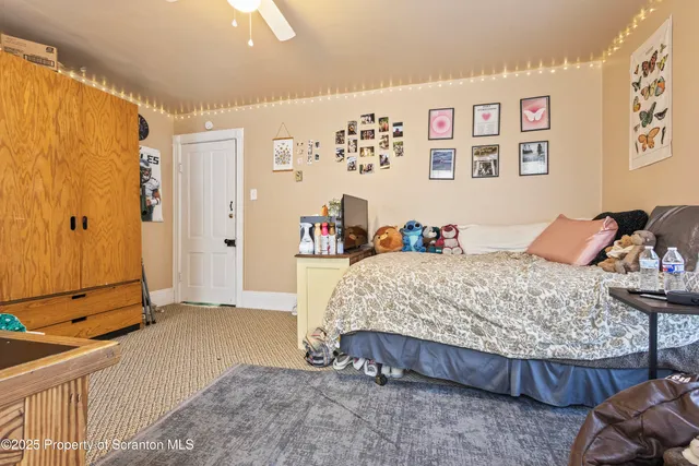 a bed room with a bed and a couch