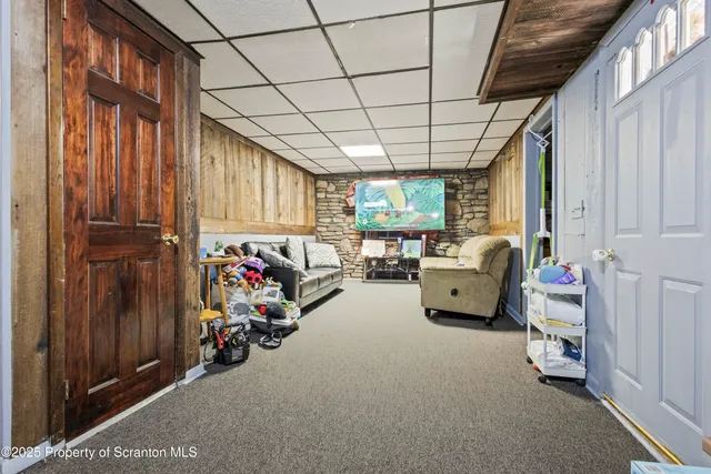 a garage with furniture and a window