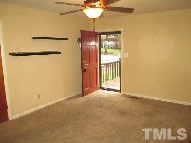 704 Cooper Road Raleigh, NC 27610 - Photo 3 of 25 a view of livingroom with window