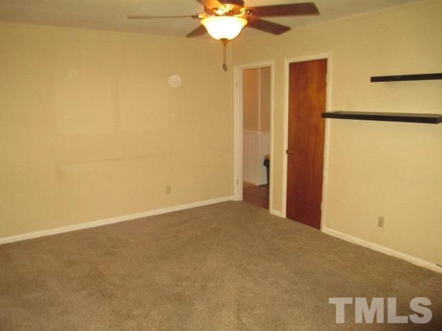 704 Cooper Road Raleigh, NC 27610 - Photo 5 of 25 a view of an empty room