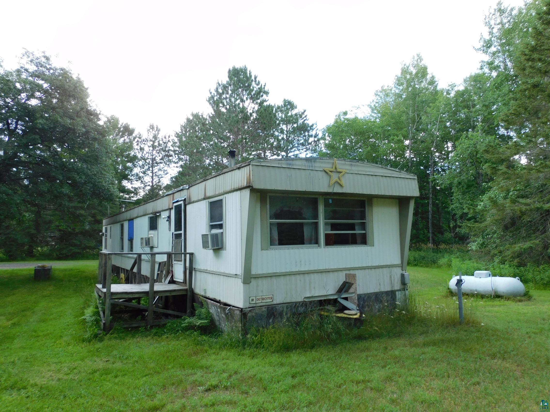 69250 County Line Road Brule, WI 54820 - Photo 3 of 23 Three bedroom 2 bath 1980 mobile home