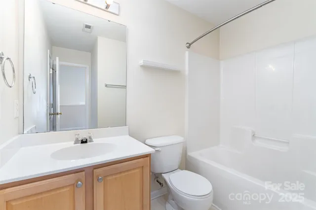 a bathroom with a sink a toilet and a bathtub