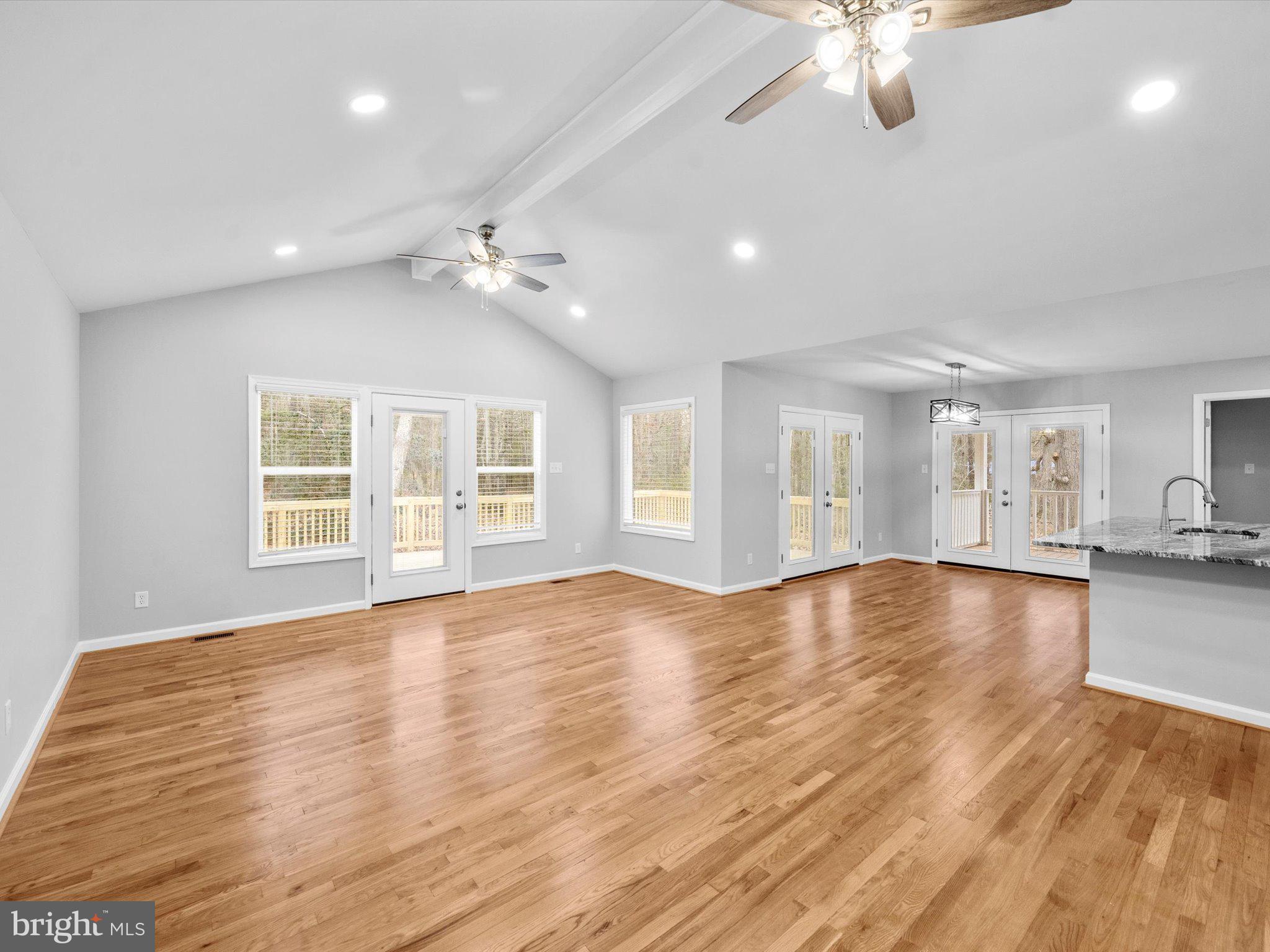 10009 River Road Petersburg, VA 23803 - Photo 11 of 59 a view of an empty room with window and wooden floor