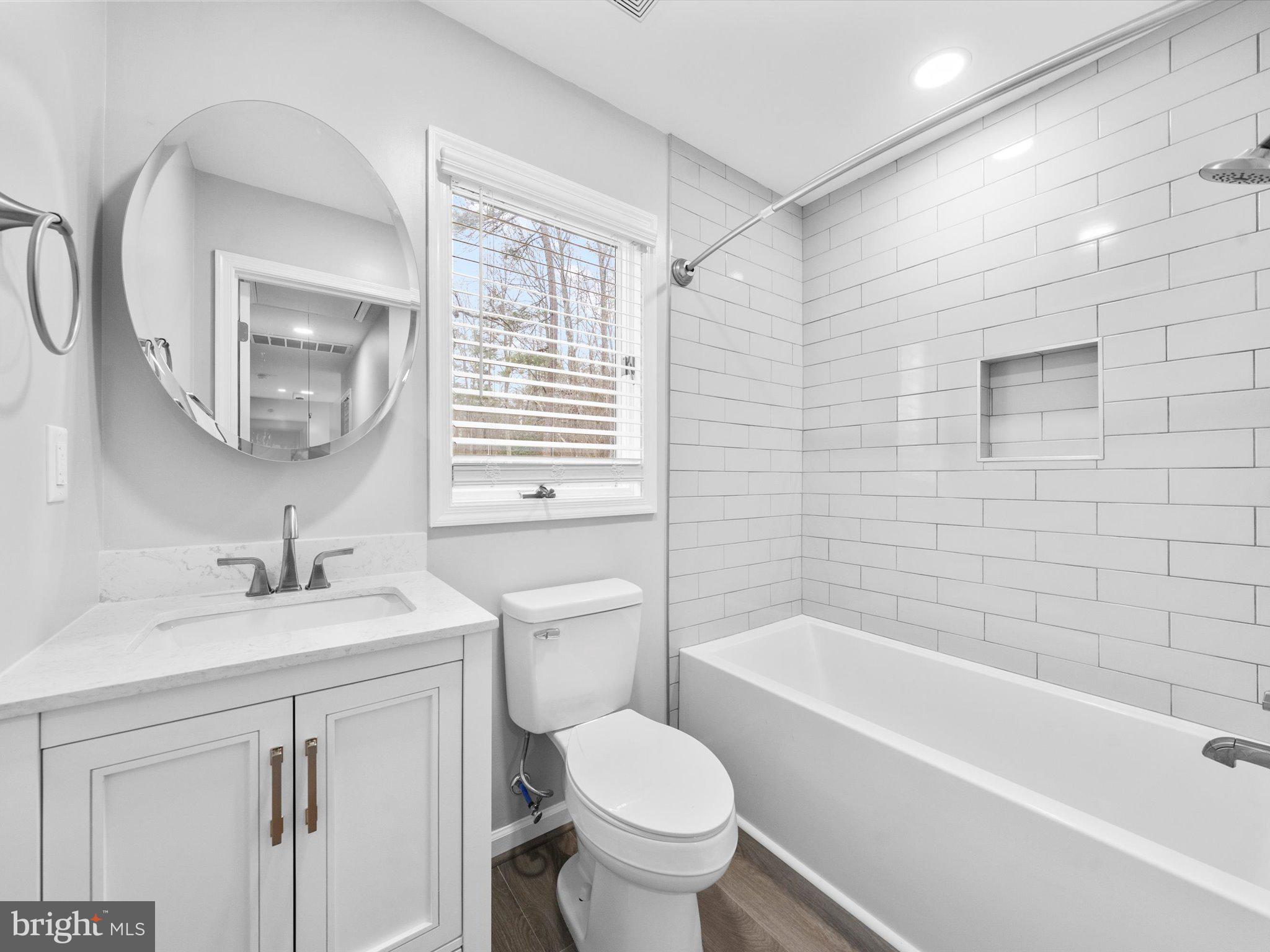 10009 River Road Petersburg, VA 23803 - Photo 37 of 59 a bathroom with a sink toilet and bathtub