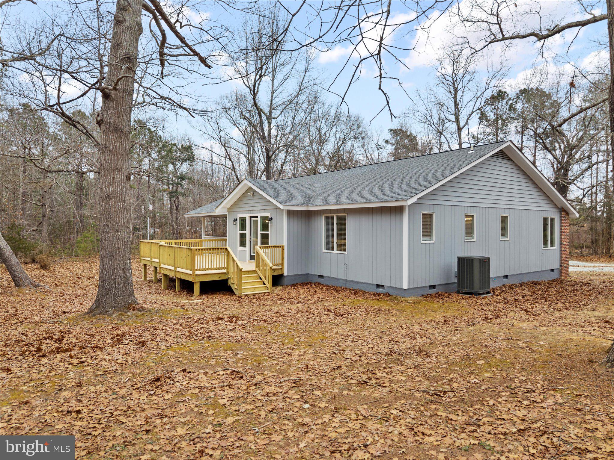 10009 River Road Petersburg, VA 23803 - Photo 47 of 59 a view of a house with a yard