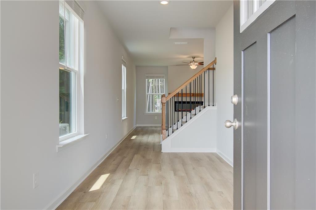 84 Hydrangea Circle Fairburn, GA 30213 - Photo 4 of 23 a view of entryway and hall with wooden floor