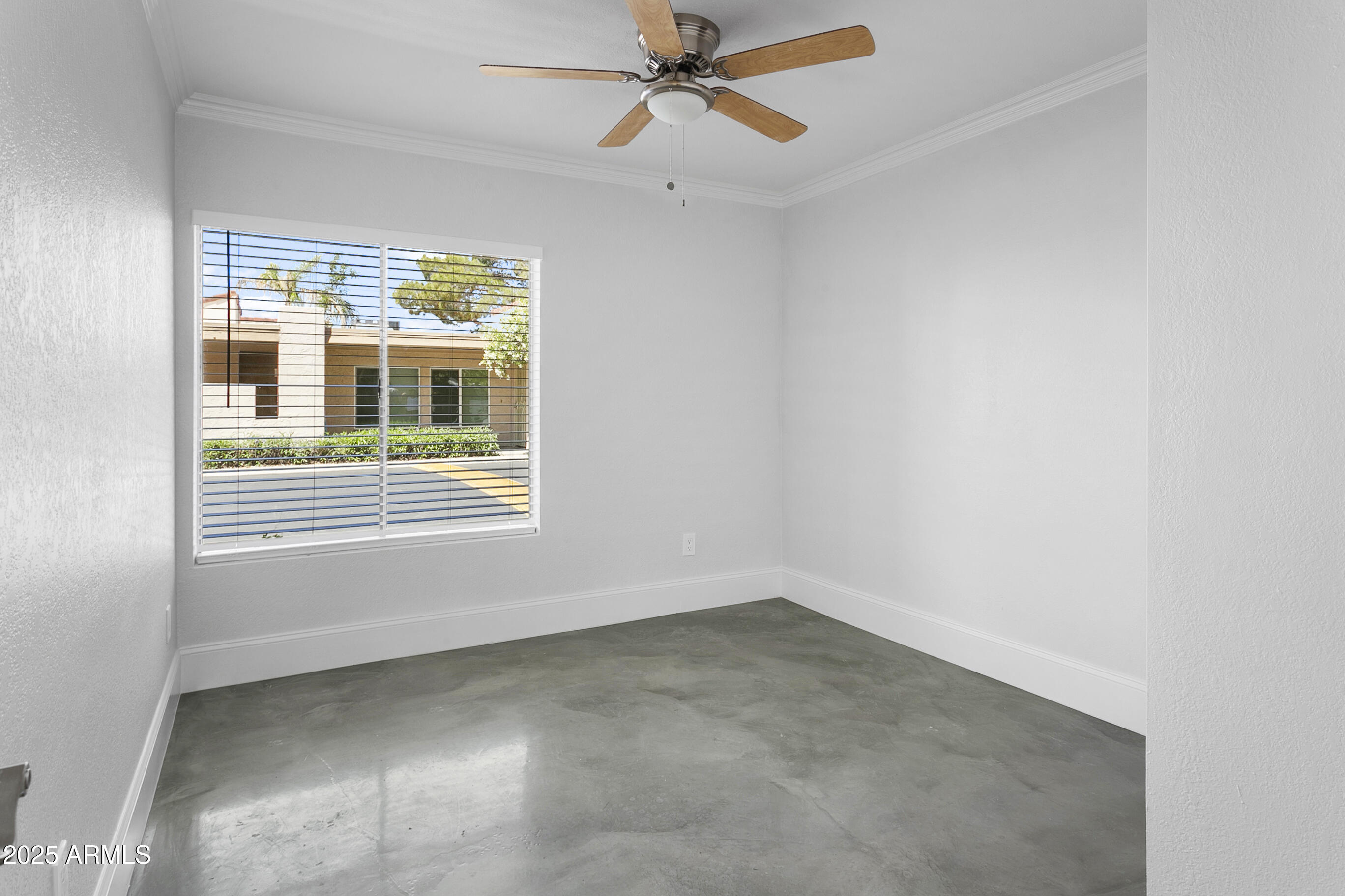 6350 North 78th Street, Unit 290 Scottsdale, AZ 85250 - Photo 11 of 19 a view of an empty room with a window