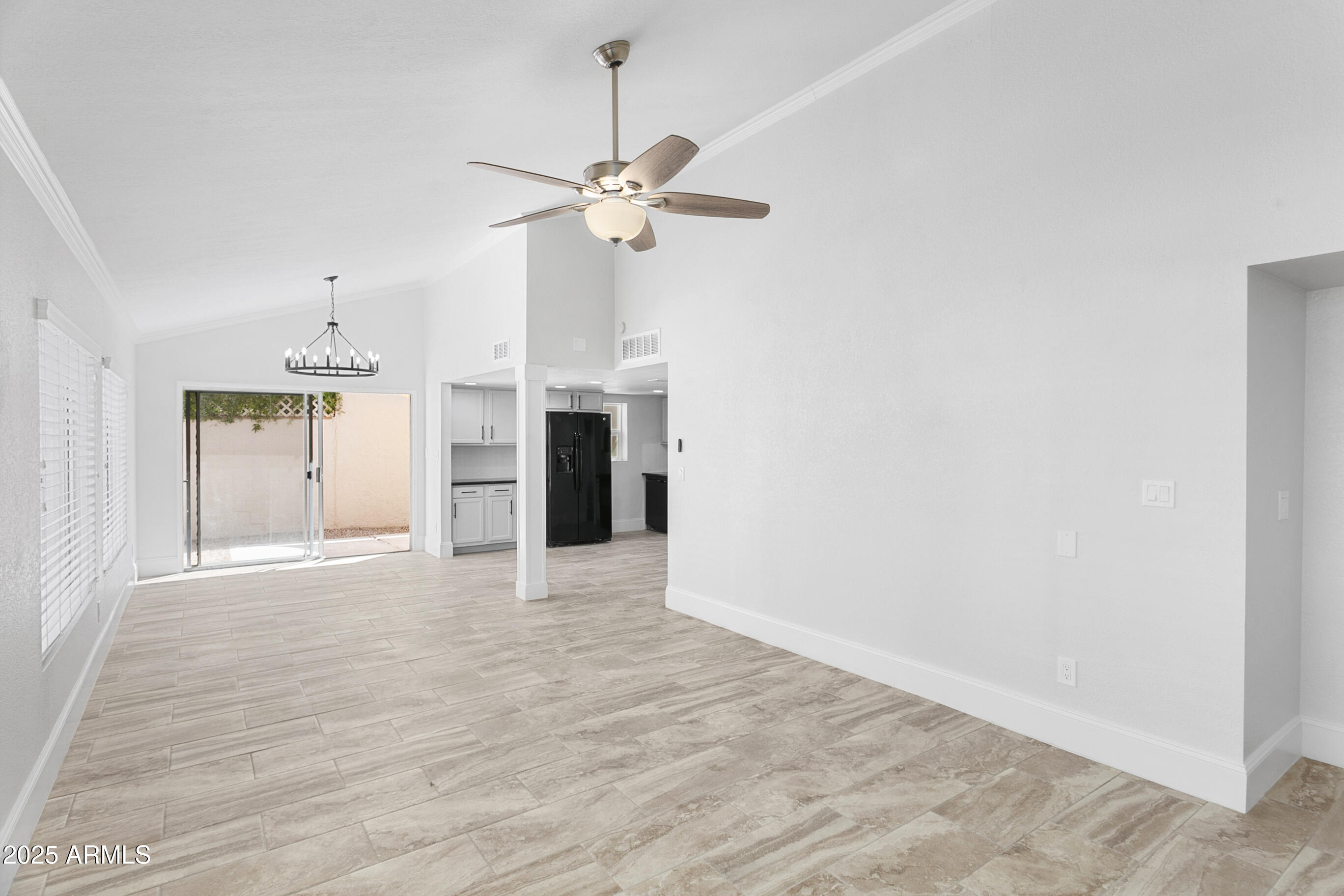 6350 North 78th Street, Unit 290 Scottsdale, AZ 85250 - Photo 4 of 19 a view of an empty room with a window