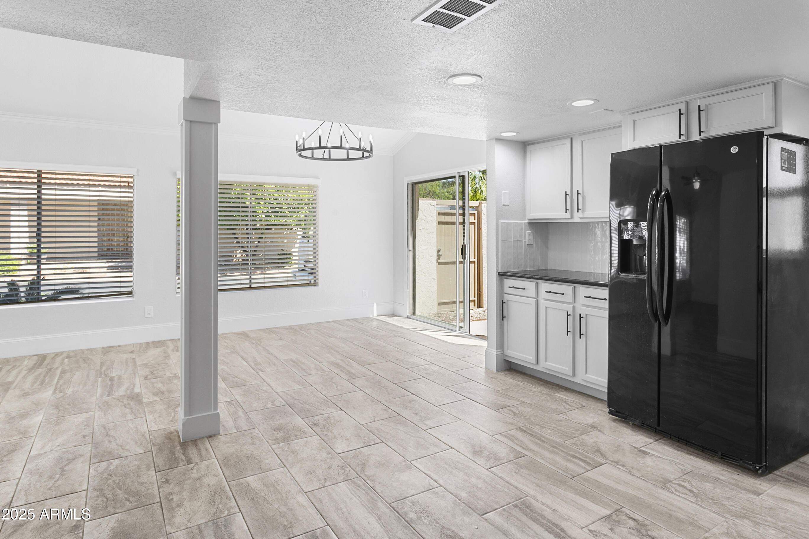 6350 North 78th Street, Unit 290 Scottsdale, AZ 85250 - Photo 8 of 19 a kitchen with stainless steel appliances a refrigerator sink and cabinets