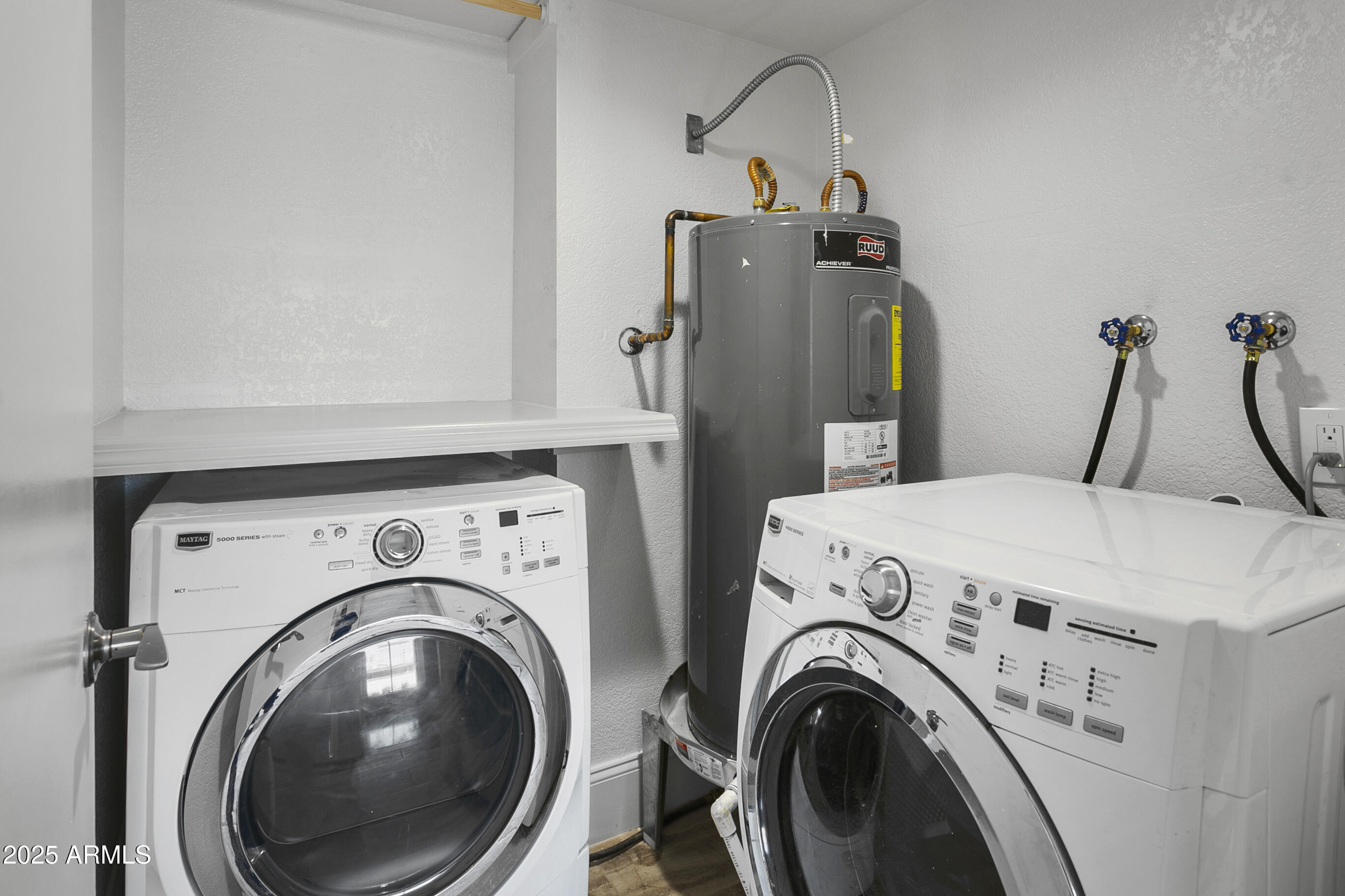 6350 North 78th Street, Unit 290 Scottsdale, AZ 85250 - Photo 9 of 19 a utility room with dryer and washer