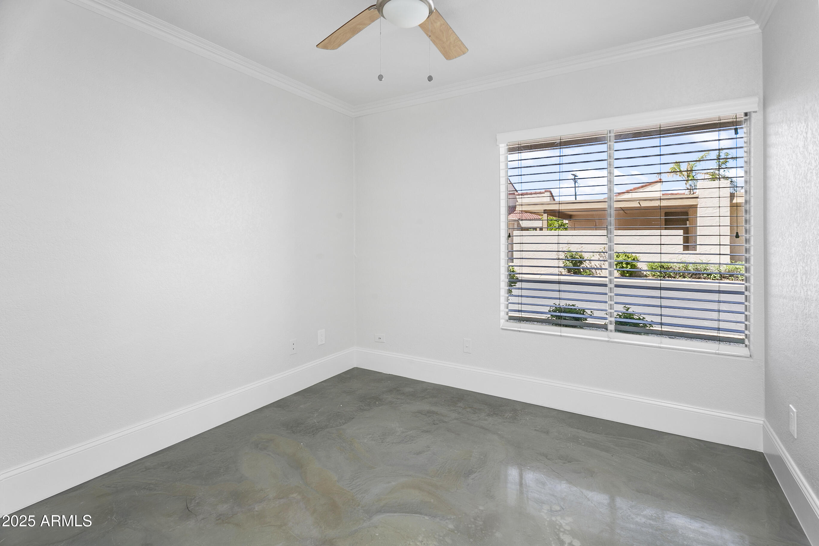 6350 North 78th Street, Unit 290 Scottsdale, AZ 85250 - Photo 10 of 19 an empty room with a window