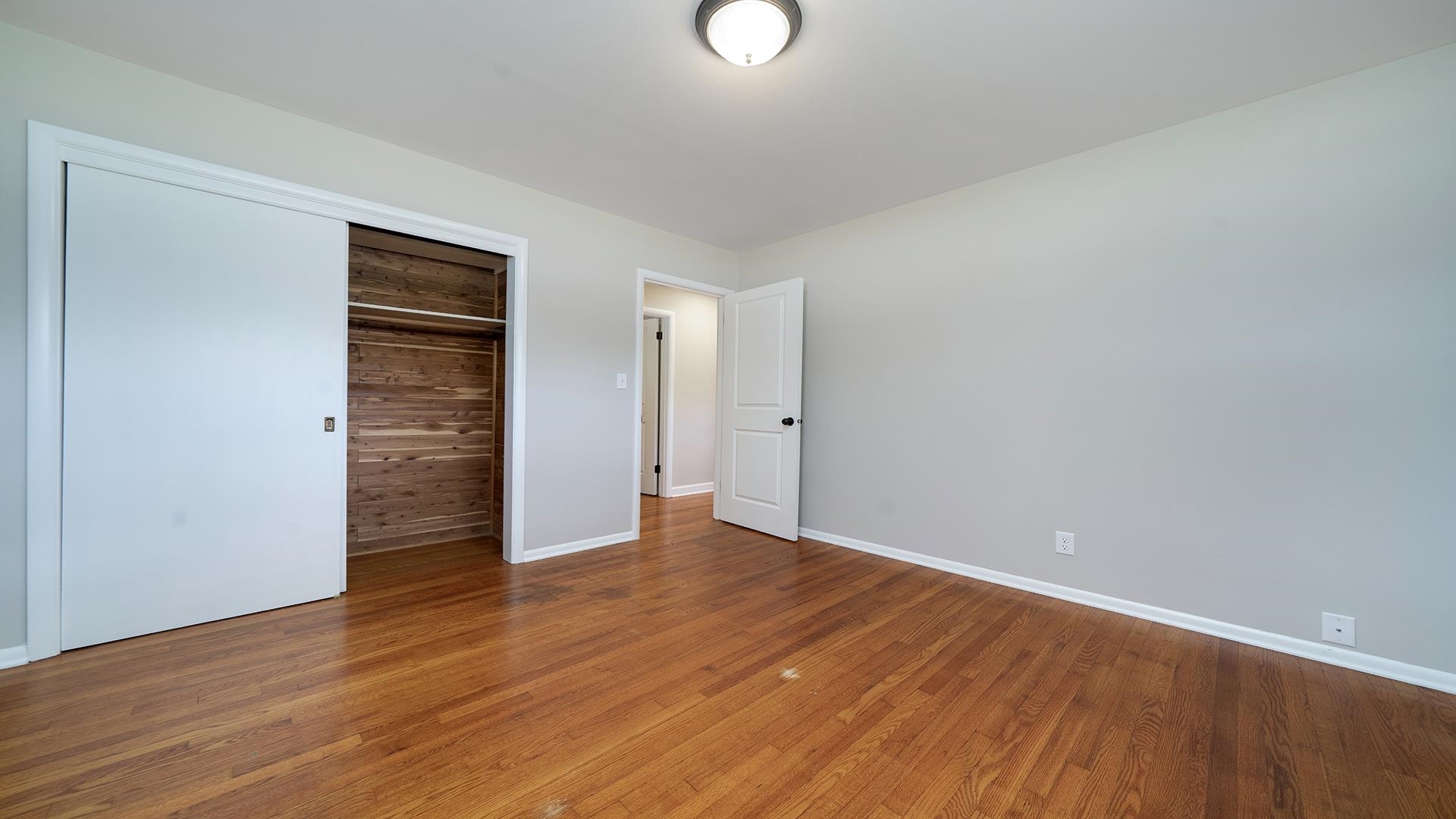 4604 Mohawk Road Rockford, IL 61107 - Photo 16 of 30 a view of an empty room with wooden floor